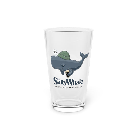 The Salty Whale cartoon mascot pint glass inspired by Widow's Bay Apple TV series, 16oz beer glass with white background