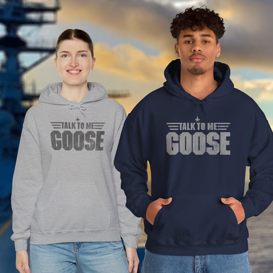 Two people wearing Talk to Me Goose vintage distressed graphic hoodies inspired by Top Gun, heavy blend cotton sweatshirt