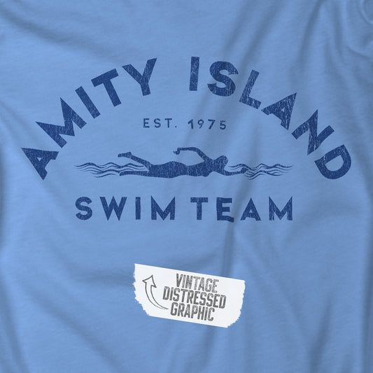 Closeup view of a Carolina Blue colored Soft Unisex Hoodie Heavy Blend Hooded Sweatshirt featuring an Amity Island Swim Team logo graphic, designed by ScriptedBrand, and inspired by the movie Jaws in a vintage distressed style.