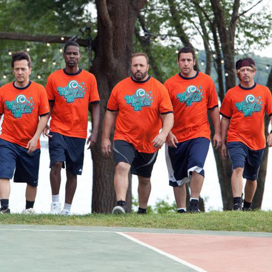 Scene from Grown Ups movie with five men wearing orange Water Wizz tees