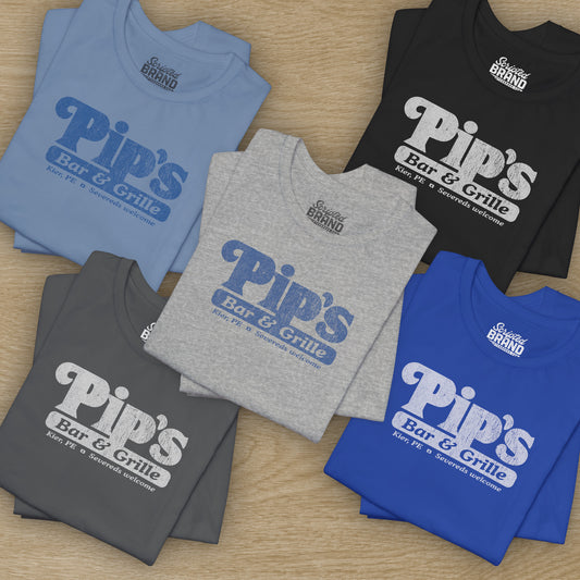 Group of 5 Soft Bella+Canvas shirtsleeve t-shirts with the Pips Bar and Grill logo from the TV show Severance in a vintage distressed ink-stamped worn-in style.