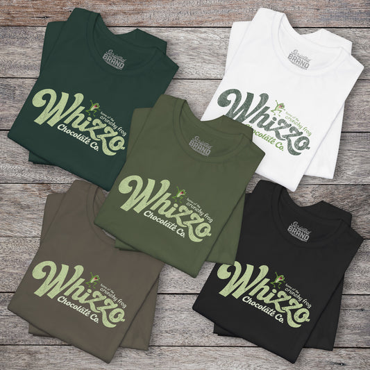 5 folded t-shirts with vintage Whizzo Chocolate Co. logo, inspired by Monty Python, featuring “home of the crunchy frog” graphic.