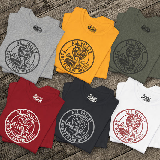 Six folded Cobra Kai All Valley Karate Championship vintage distressed graphic t-shirts, soft Bella+Canvas cotton Karate Kid tees
