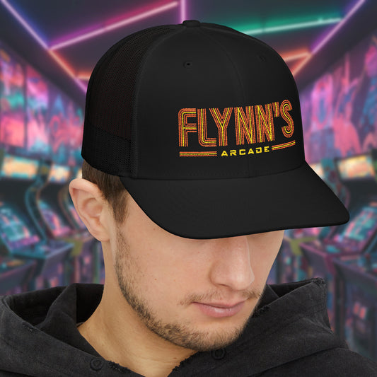 Man wearing Black Richardson 112 snapback trucker cap with 'Flynn’s Arcade' neon logo inspired by TRON.