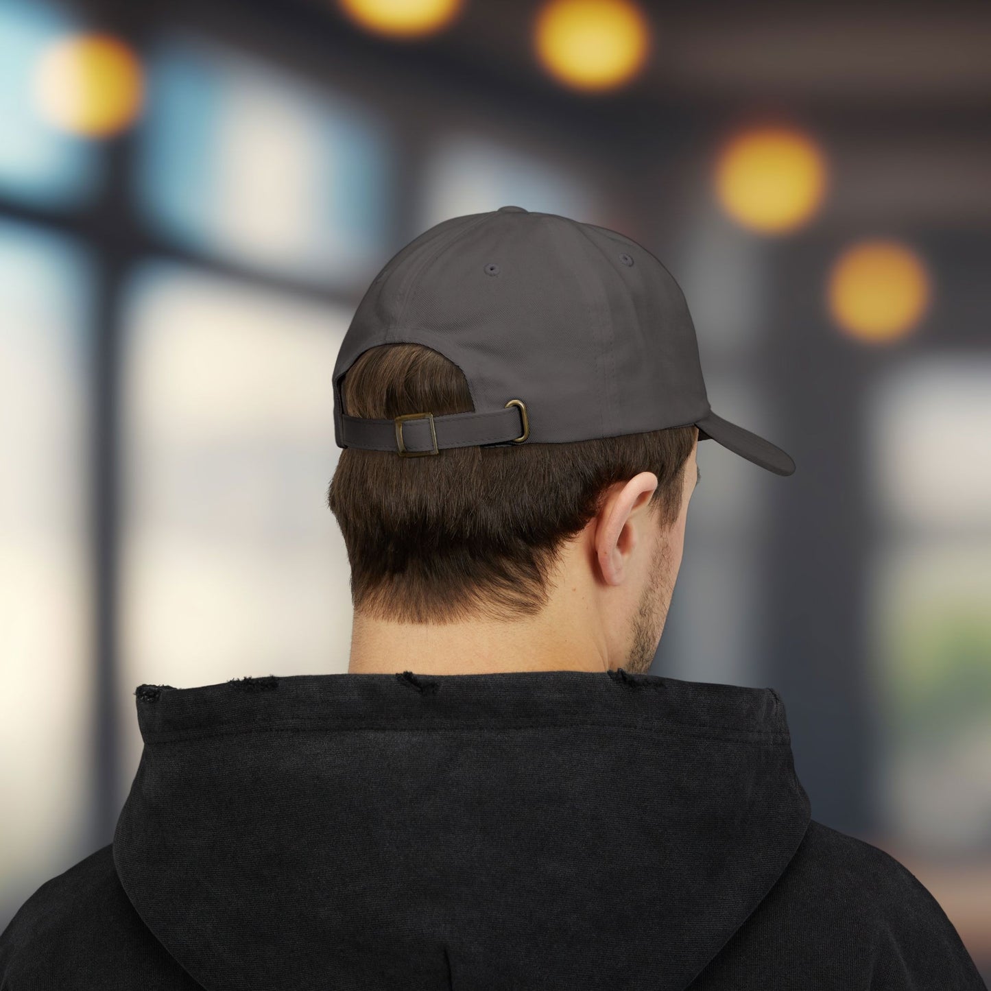 Back view of Yupoong dad cap with embroidered Weyland-Yutani Corp patch logo from the Alien franchise in yellow and silver