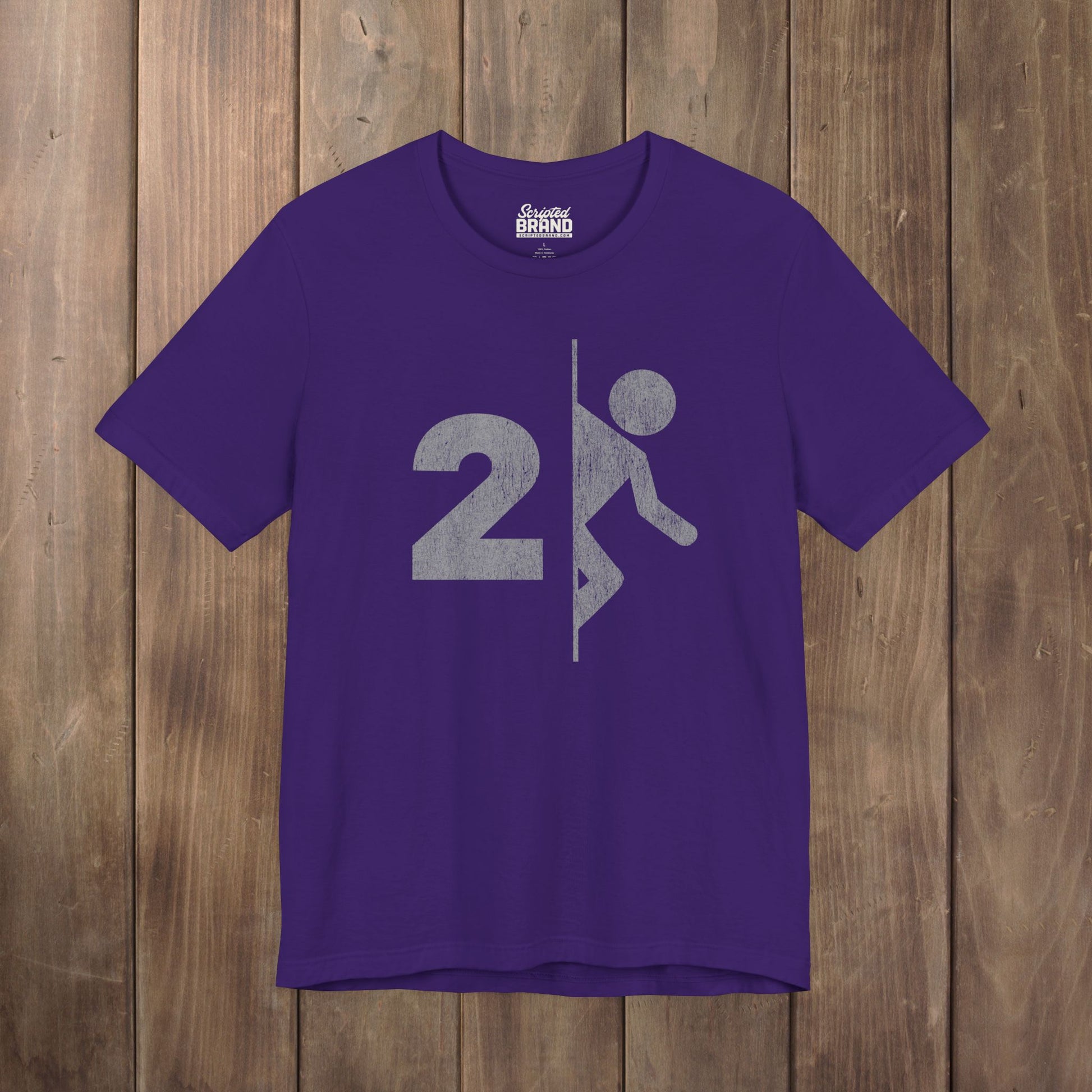 Purple tee with vintage distressed Portal 2 partial logo figure diving through a portal, aperture labs