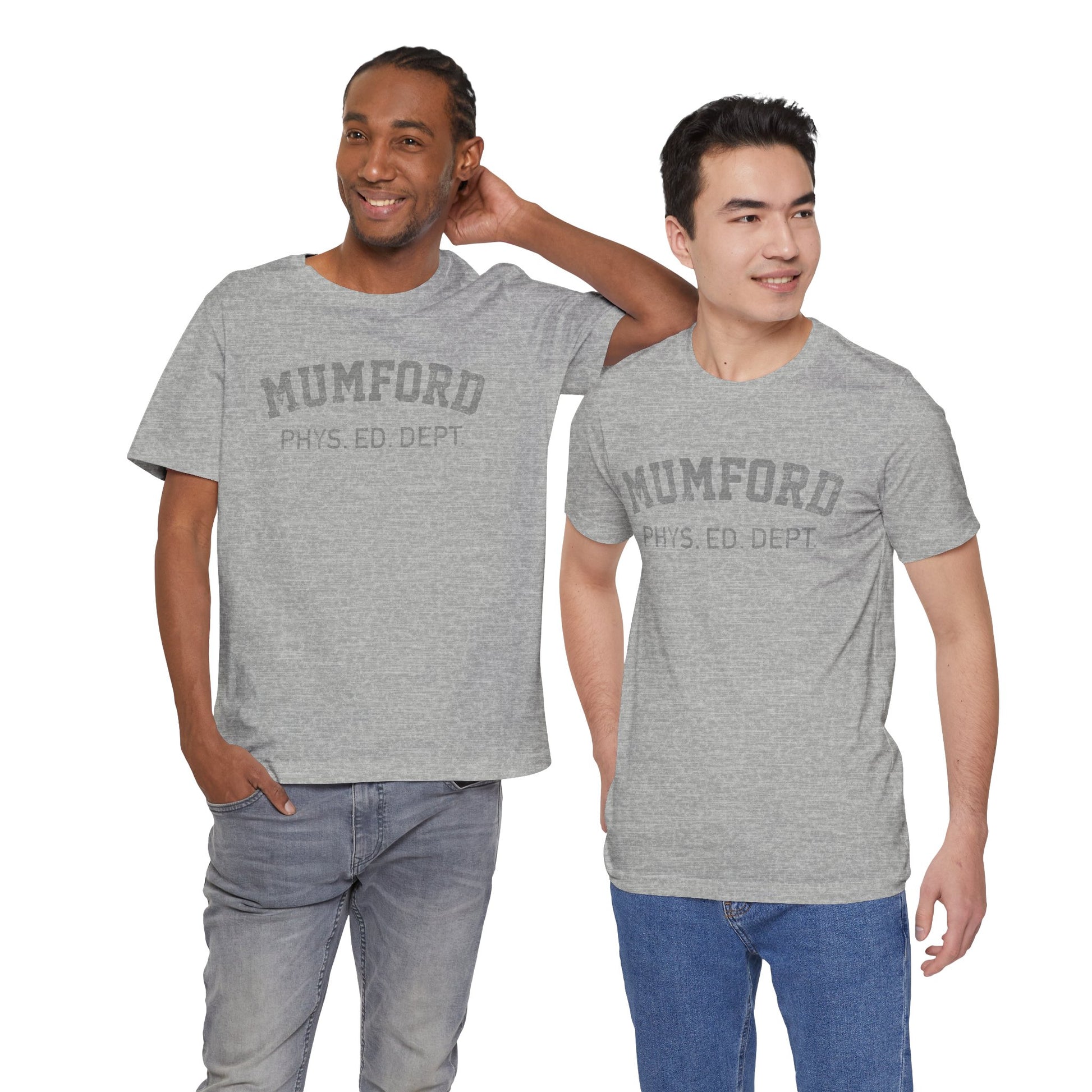 2 male models wearing Athletic Heather Grey Soft Bella+Canvas 3001 short-sleeve t-shirt gym tees featuring the Mumford Phys Ed logo graphic that Eddie Murphy wore as Axel Foley in the movie Beverly Hills Cop in a vintage distressed style, sold by ScriptedBrand.