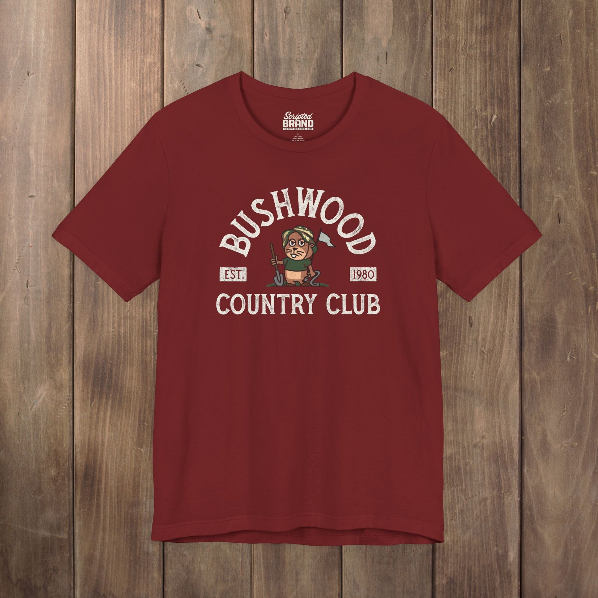 Red Bella+Canvas tee with a vintage distressed Bushwood Country Club golf gopher logo from Caddyshack