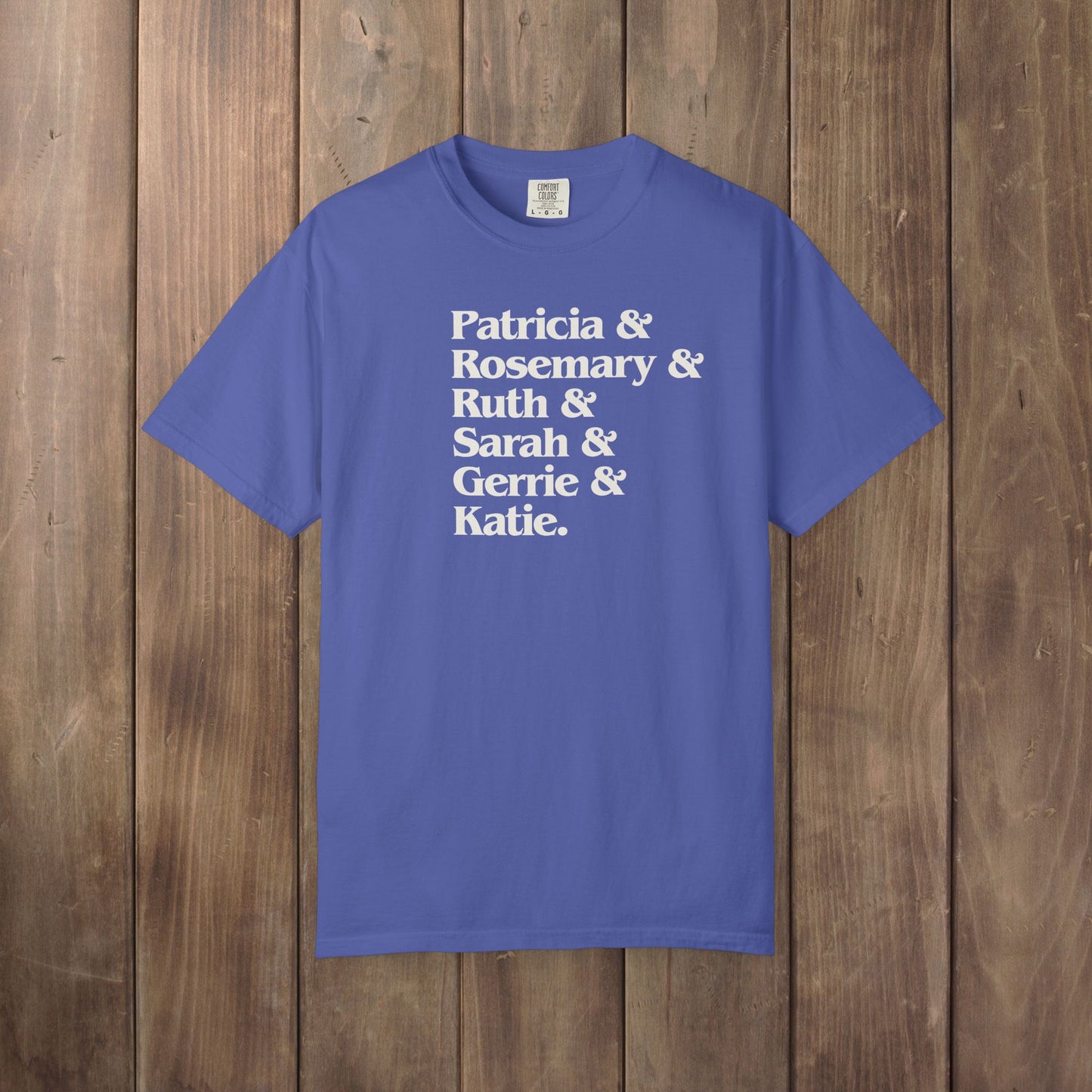 Periwinkle blue Comfort Colors tee listing the women of Widow's Bay: Patricia, Rosemary, Ruth, Sarah, Gerrie, and Katie