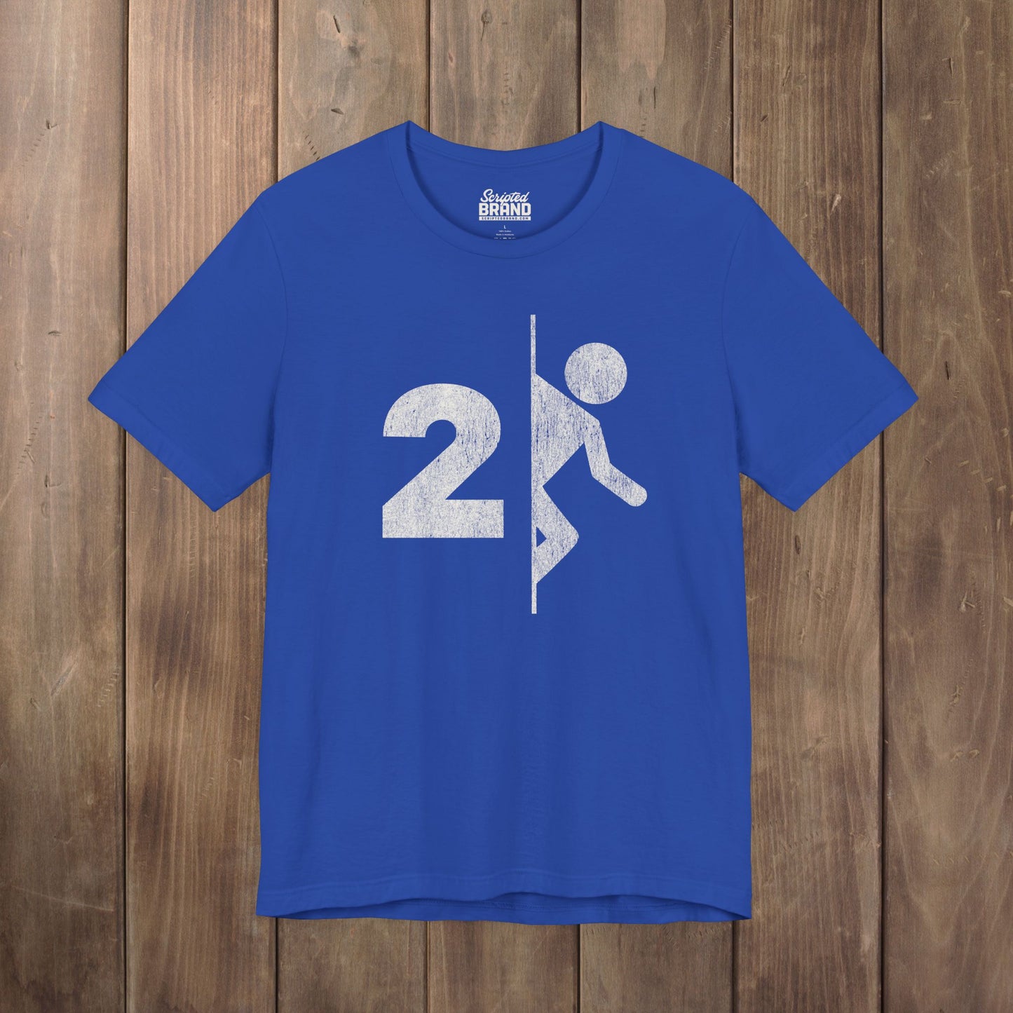Royal blue tee with vintage distressed Portal 2 partial logo figure diving through a portal, aperture labs