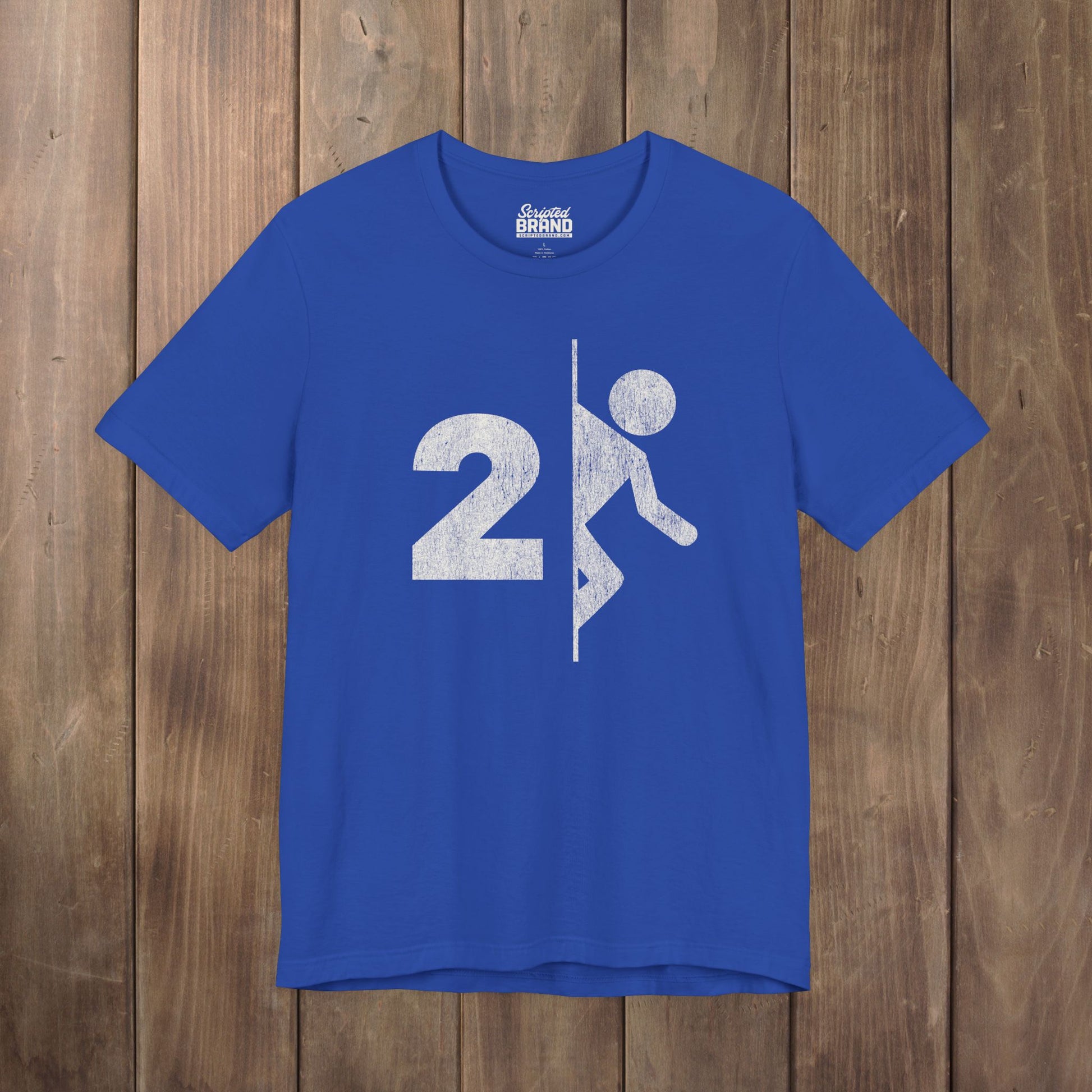 Royal blue tee with vintage distressed Portal 2 partial logo figure diving through a portal, aperture labs