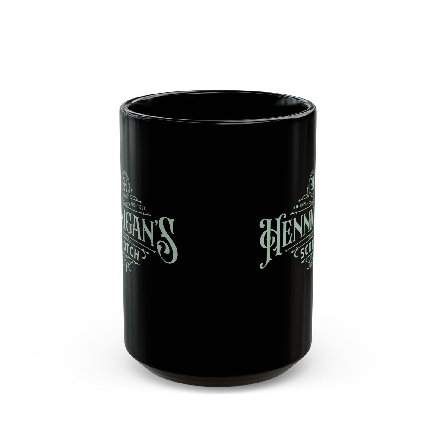 Side view of a Black mug with Hennigan's Scott Whiskey branding on a white background