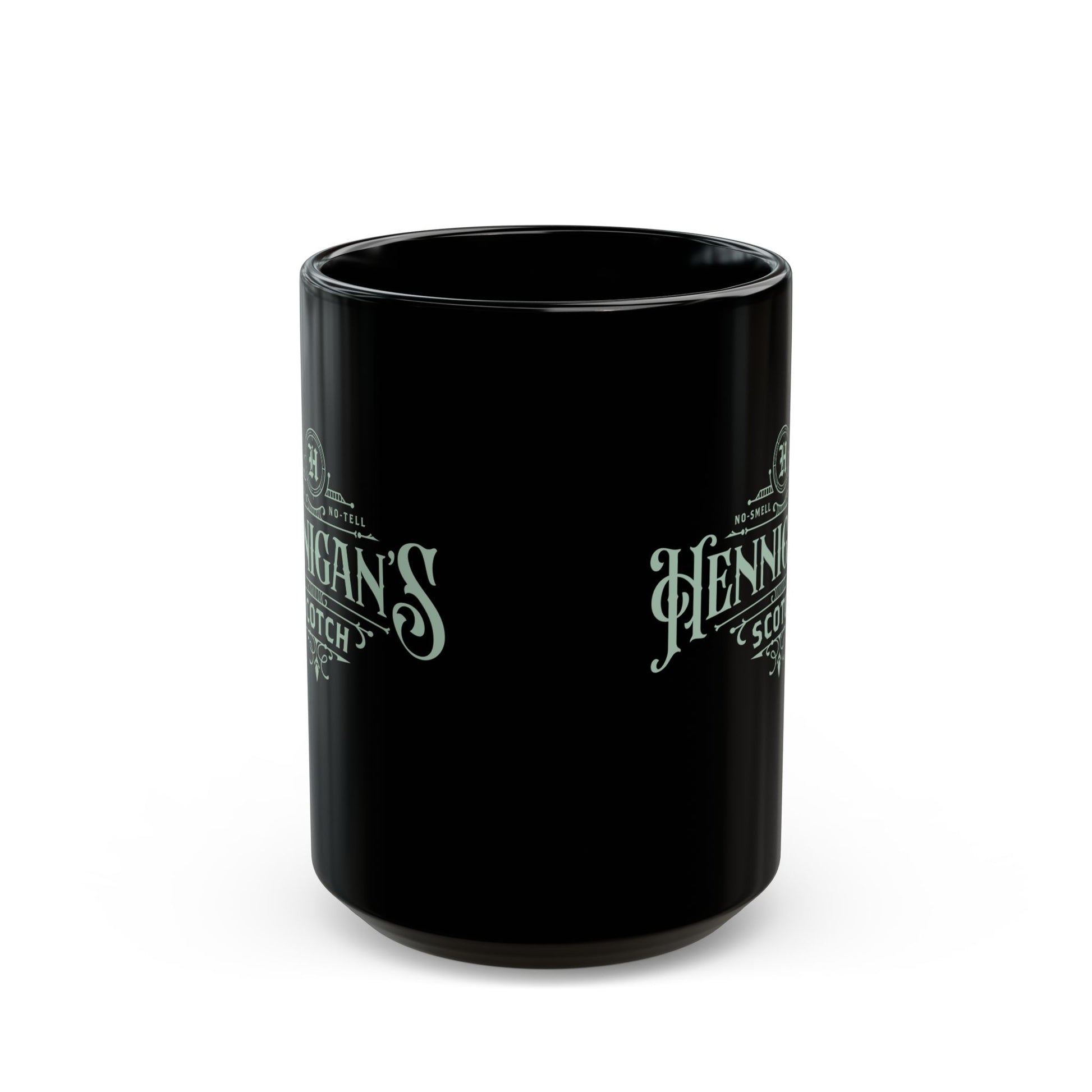 Side view of a Black mug with Hennigan's Scott Whiskey branding on a white background