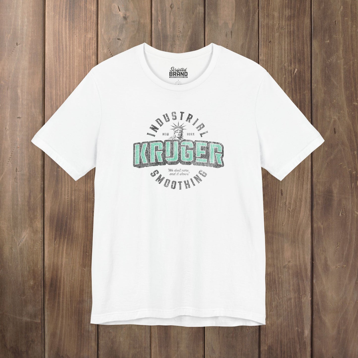 white Bella+Canvas t-shirt featuring a Kruger Industrial Smoothing logo graphic inspired by the TV show Seinfeld in a vintage distressed style.