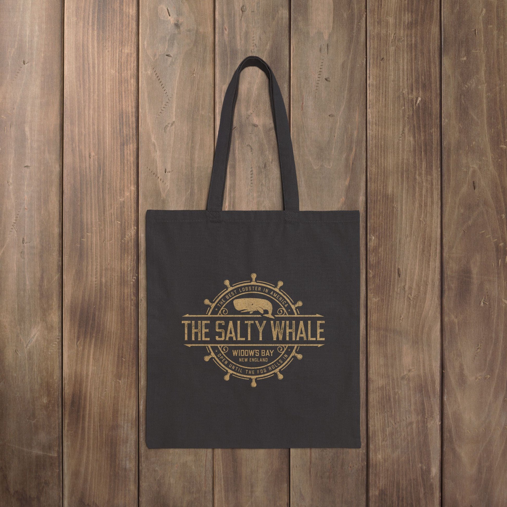 Black canvas tote bag with vintage The Salty Whale, Widow's Bay TV show nautical grocery shopping