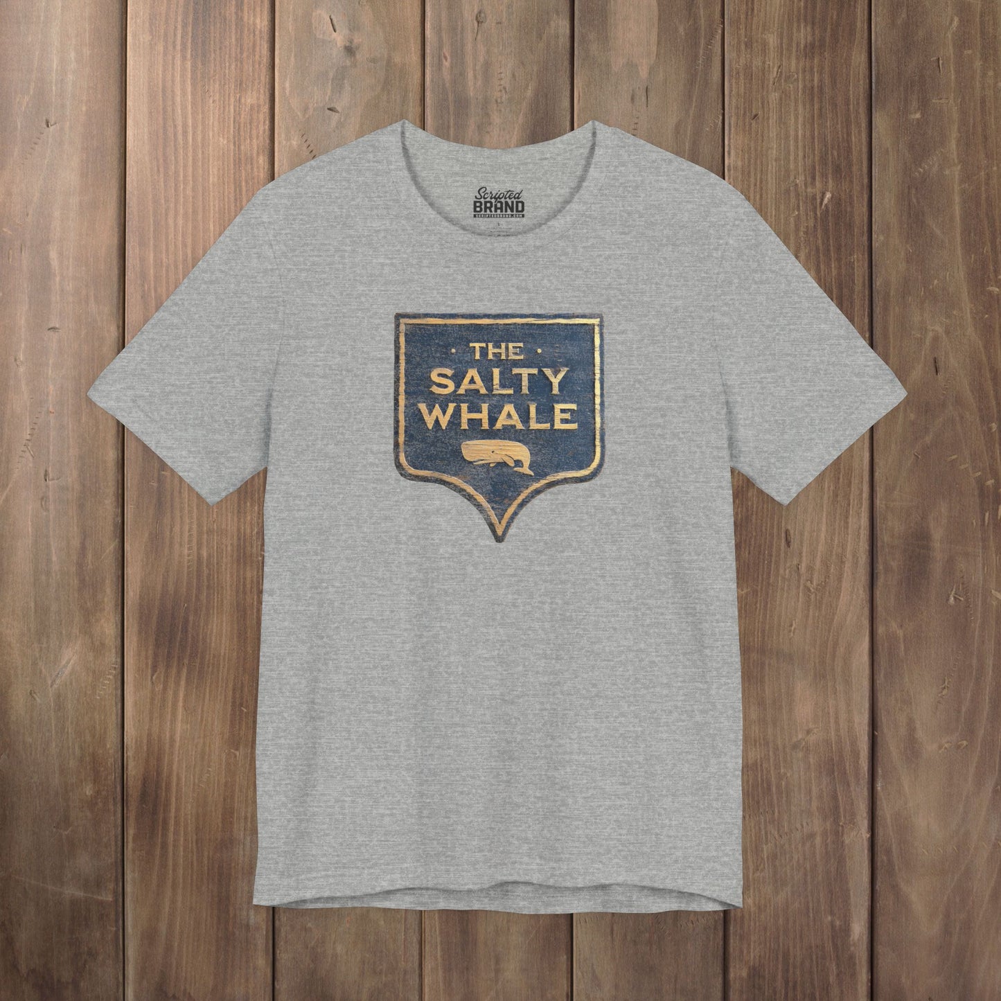 Heather gray colored 'The Salty Whale' weathered carved-wood pub sign t-shirt inspired by Widow's Bay Apple TV series, heather Bella+Canvas tee
