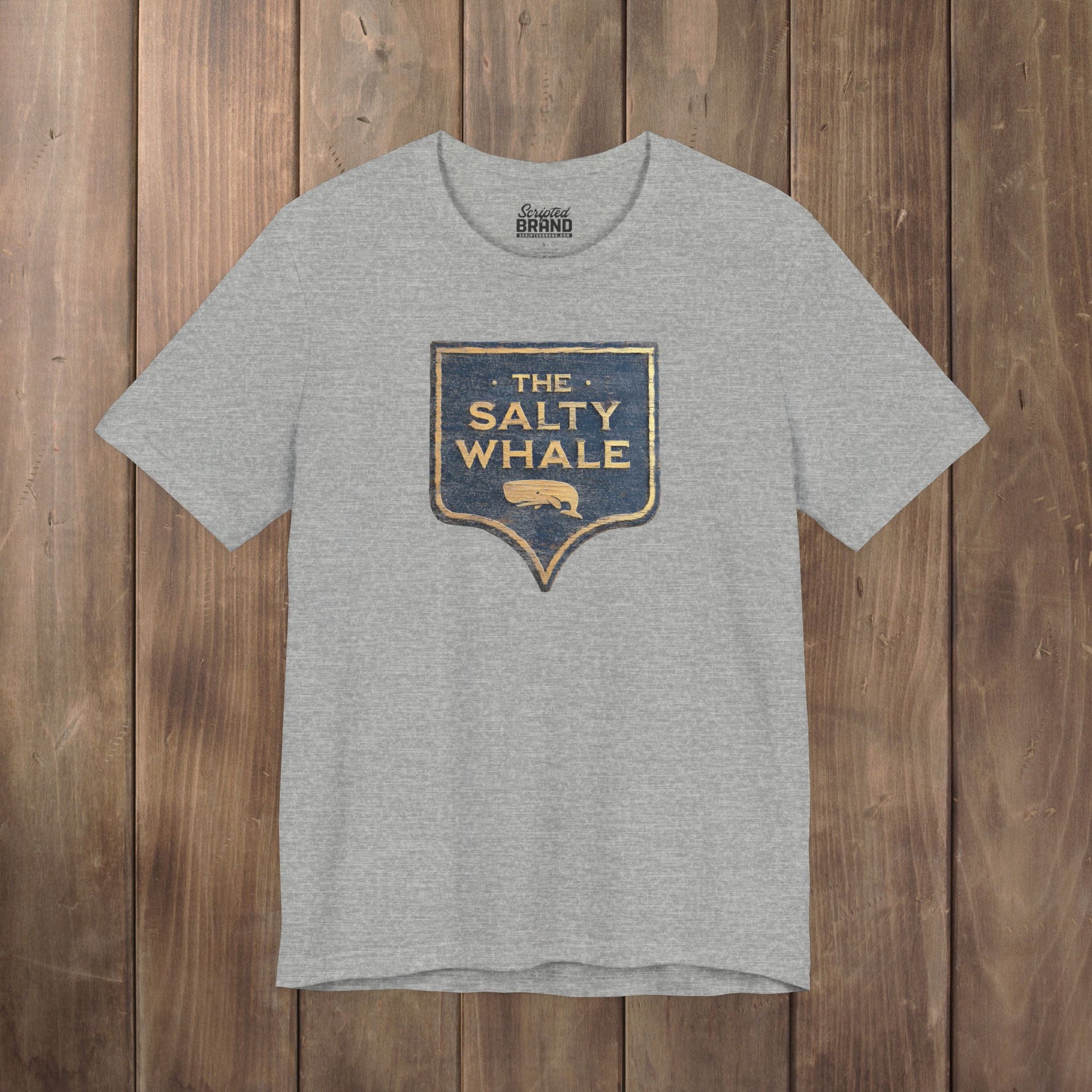 Heather gray colored 'The Salty Whale' weathered carved-wood pub sign t-shirt inspired by Widow's Bay Apple TV series, heather Bella+Canvas tee