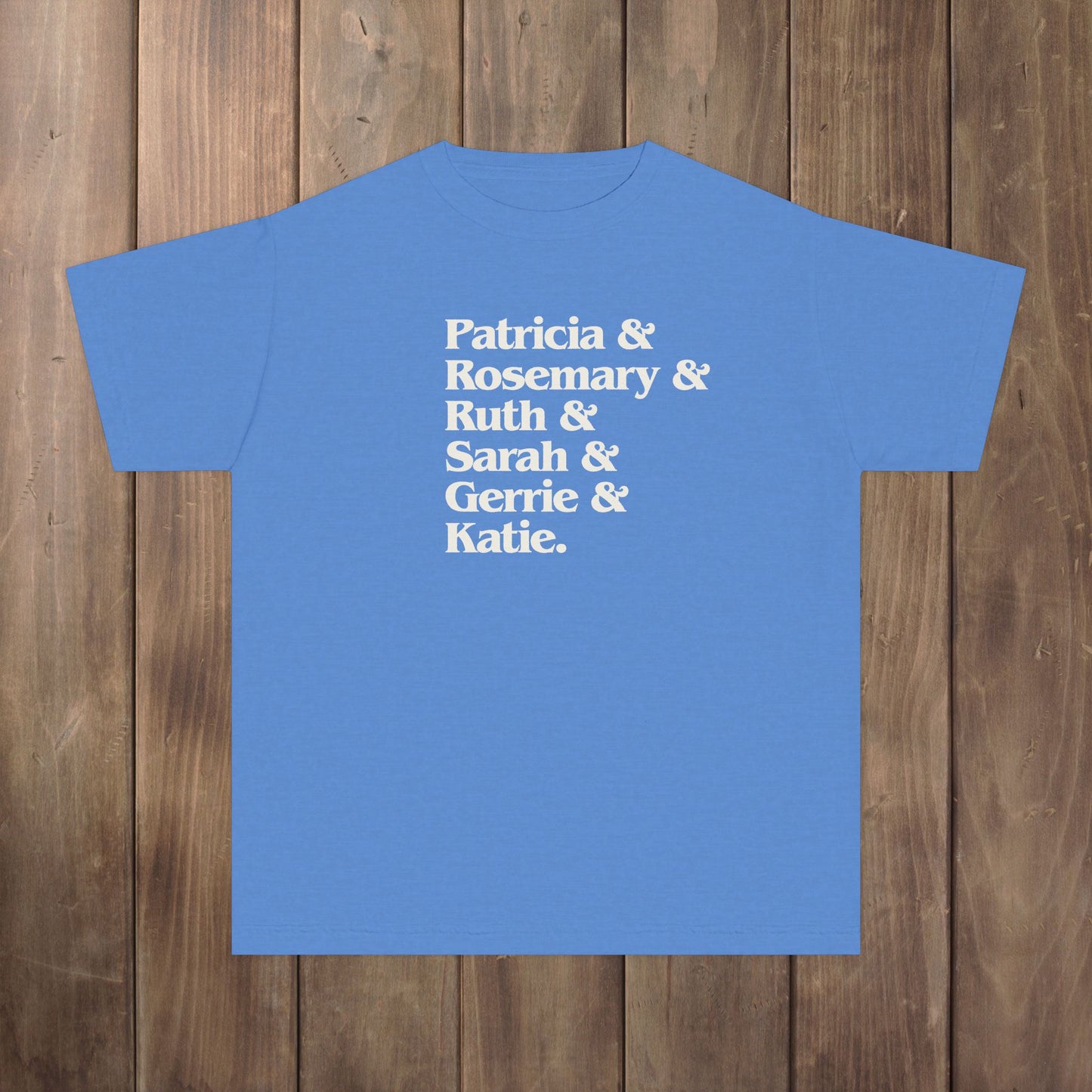 Royal Blue Caribe youth kids tee with stacked Women of Widow's Bay names in cream type