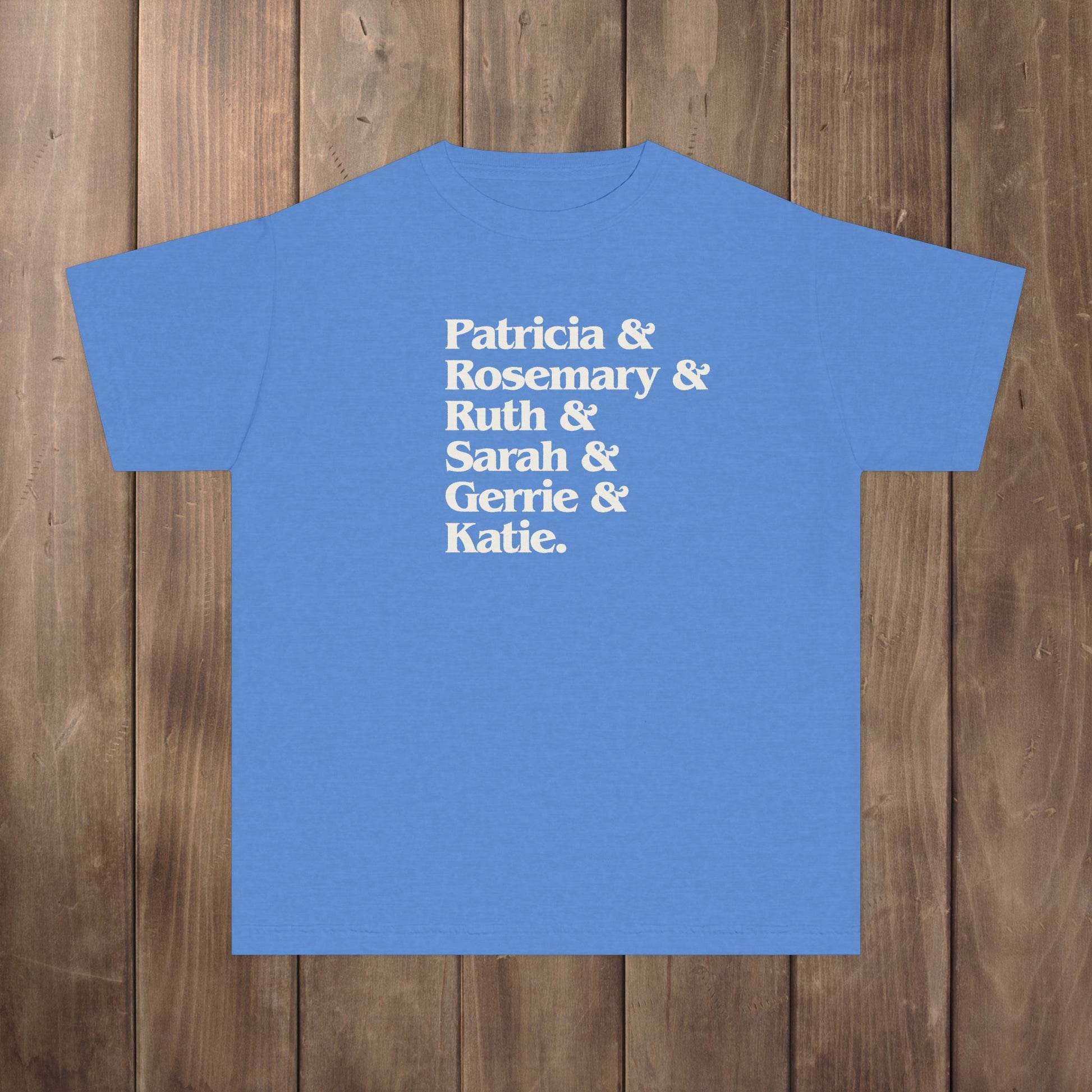 Royal Blue Caribe youth kids tee with stacked Women of Widow's Bay names in cream type