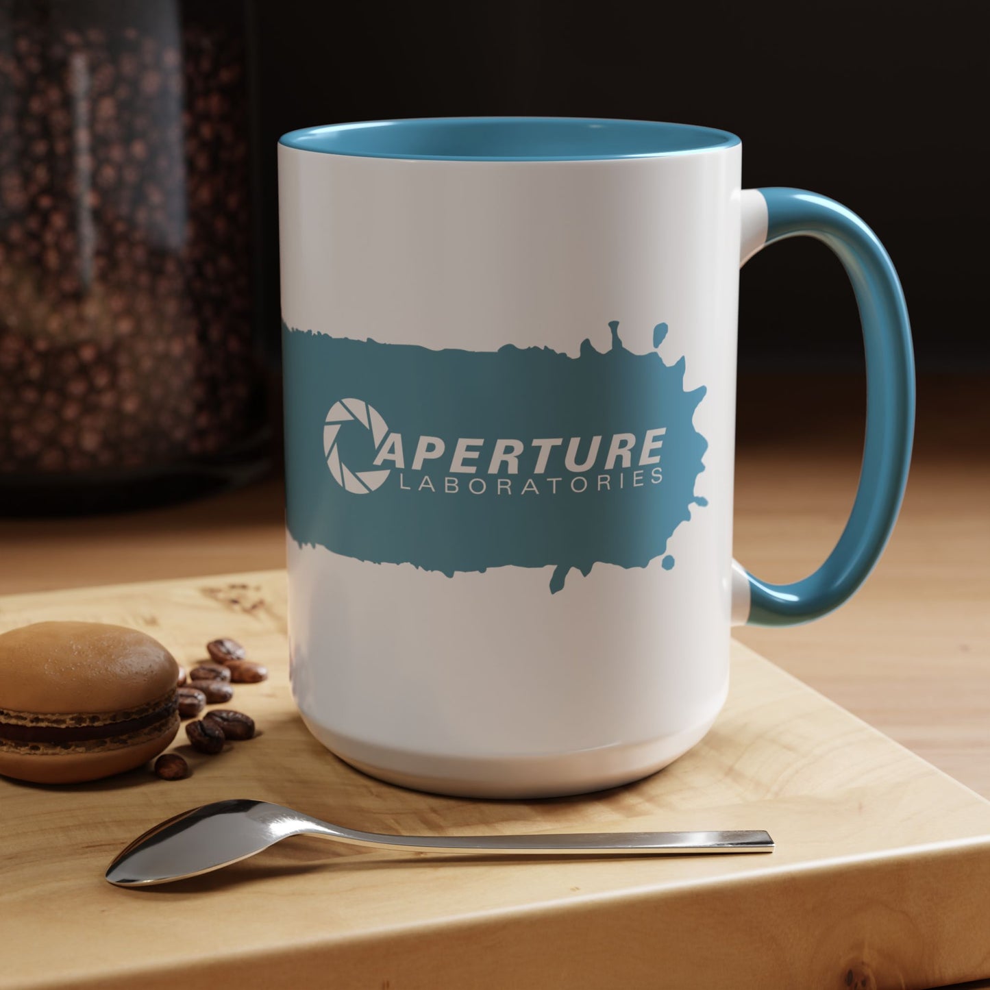 Kitchen view of 15oz Portal 2 Aperture Laboratories blue Repulsion Gel accent mug with blue handle, glossy ceramic.