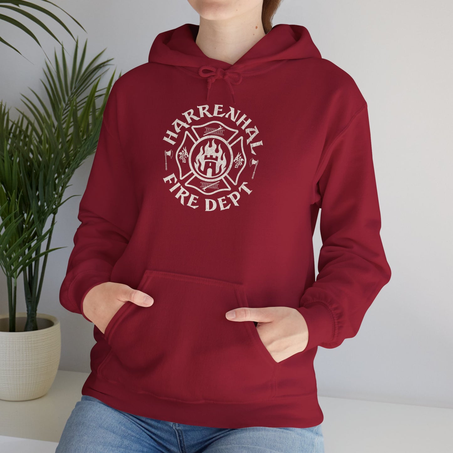 Woman wearing red Harrenhal Fire Department vintage distressed graphic hoodie, heavy pullover sweatshirt inspired by Game of Thrones