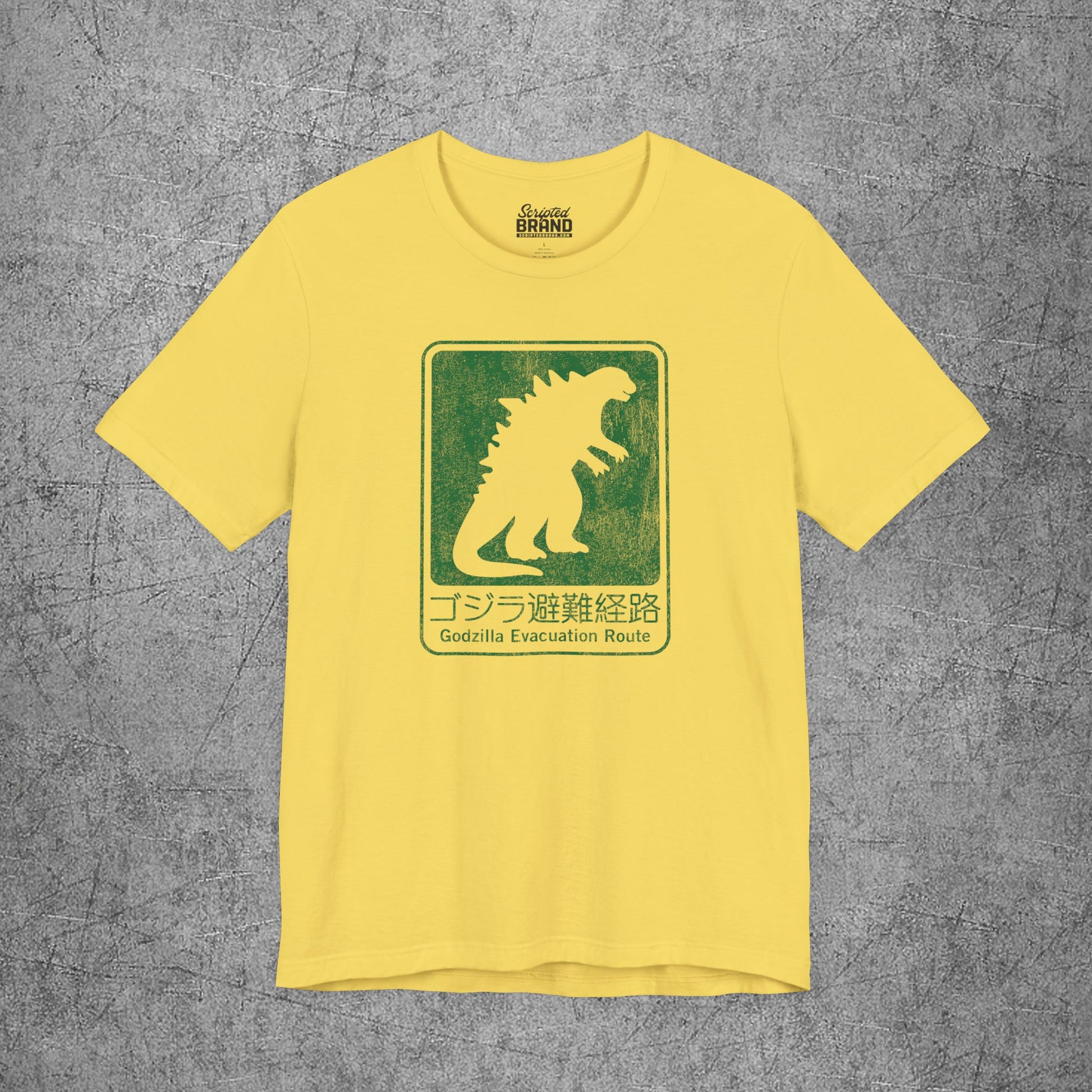 Yellow Godzilla Evacuation Route distressed graphic t-shirt inspired by Monarch Legacy of Monsters, soft Bella+Canvas tee