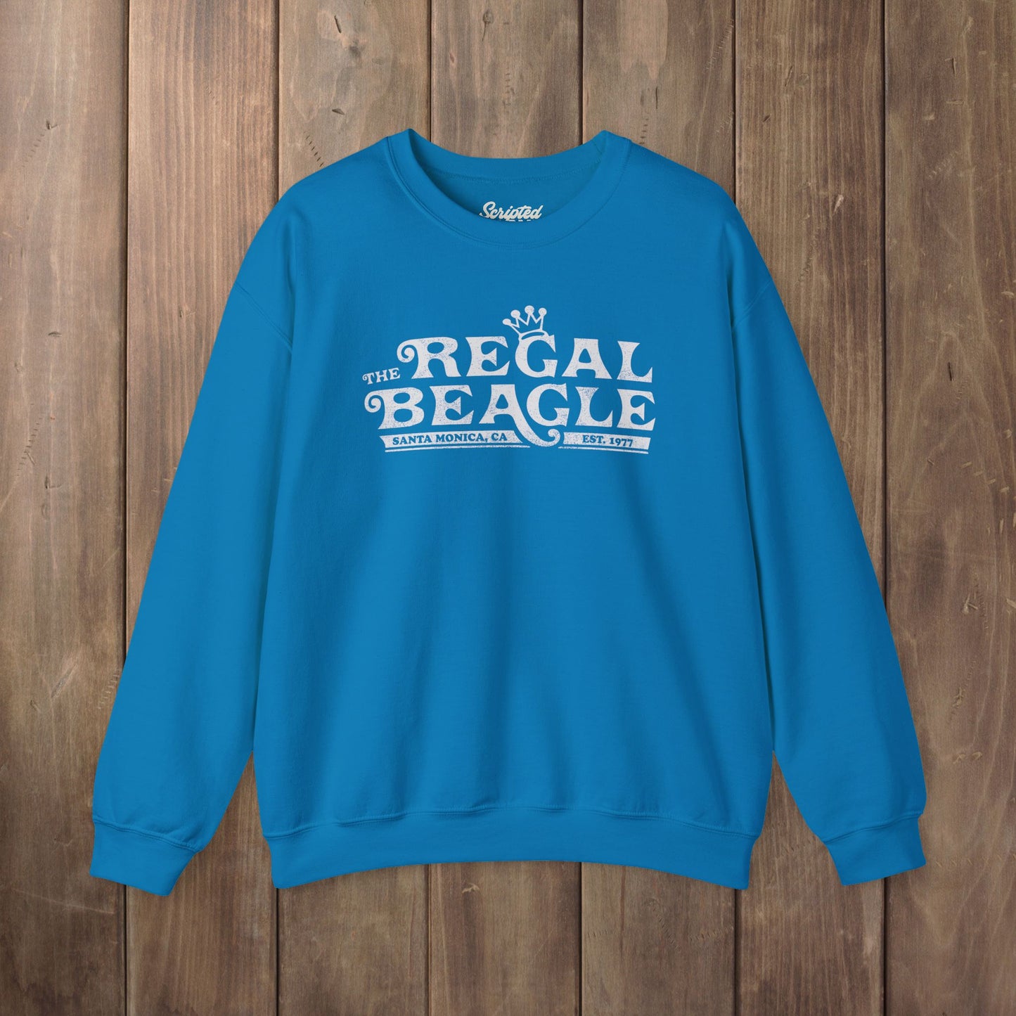 Saphire blue crewneck sweatshirt with vintage distressed blue Regal Beagle Three's Company logo