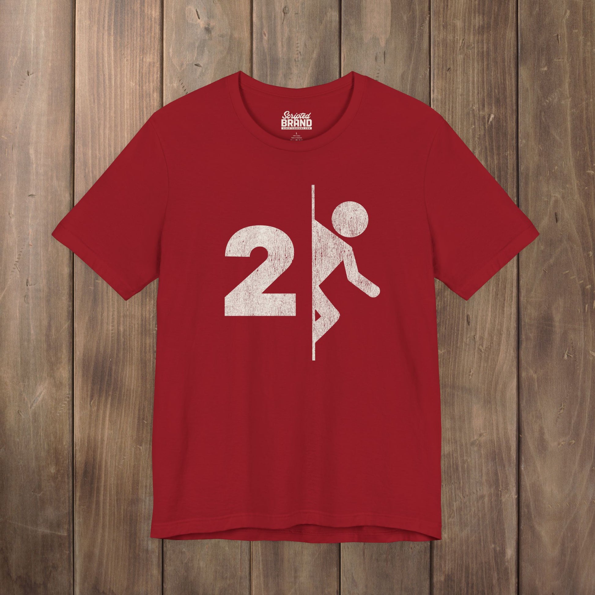 Red tee with vintage distressed Portal 2 partial logo figure diving through a portal, aperture labs