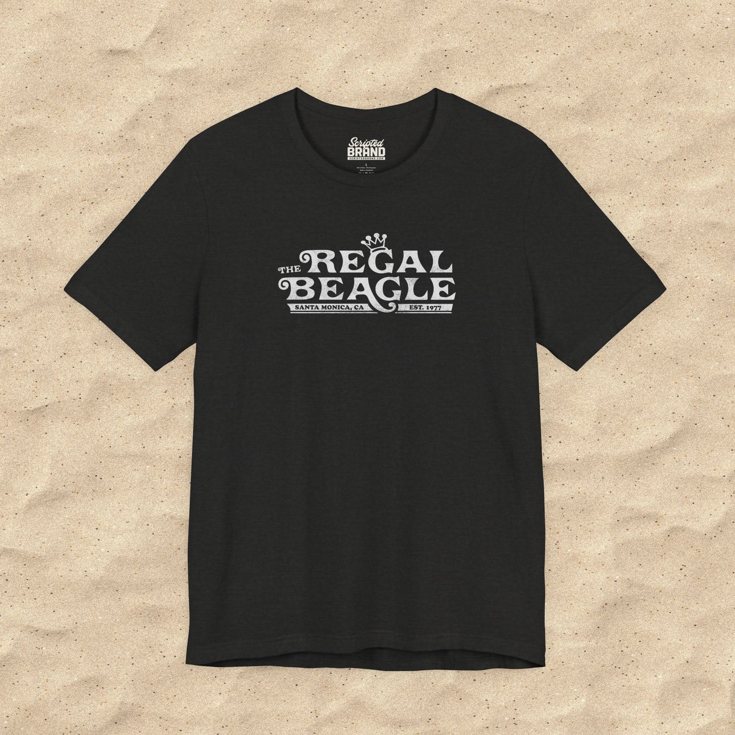Heather black Bella+Canvas t-shirt with the Regal Beagle logo from the TV Show 'Threes Company' in a vintage distressed style.