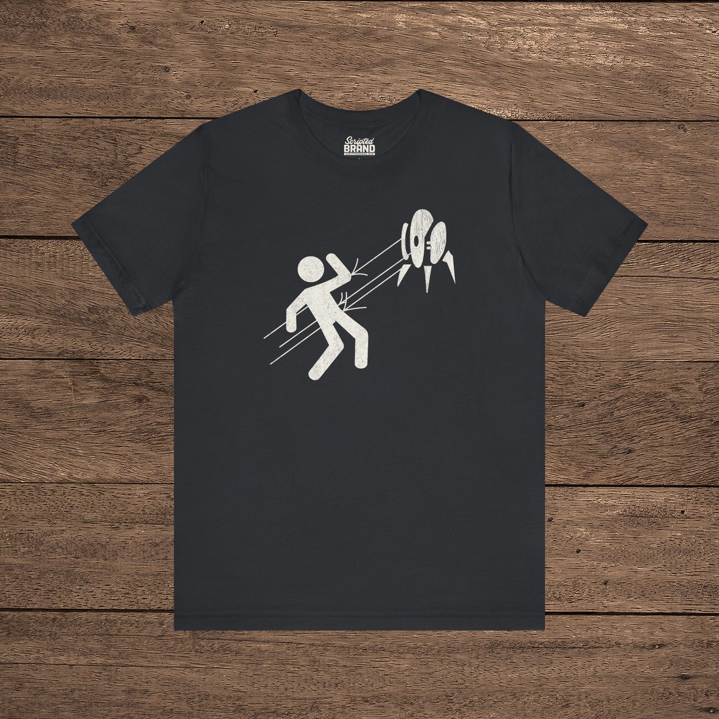 Black Aperture Science Turret warning icon t-shirt on Bella+Canvas 3001, vintage distressed print, Portal and Portal 2 fan tee.