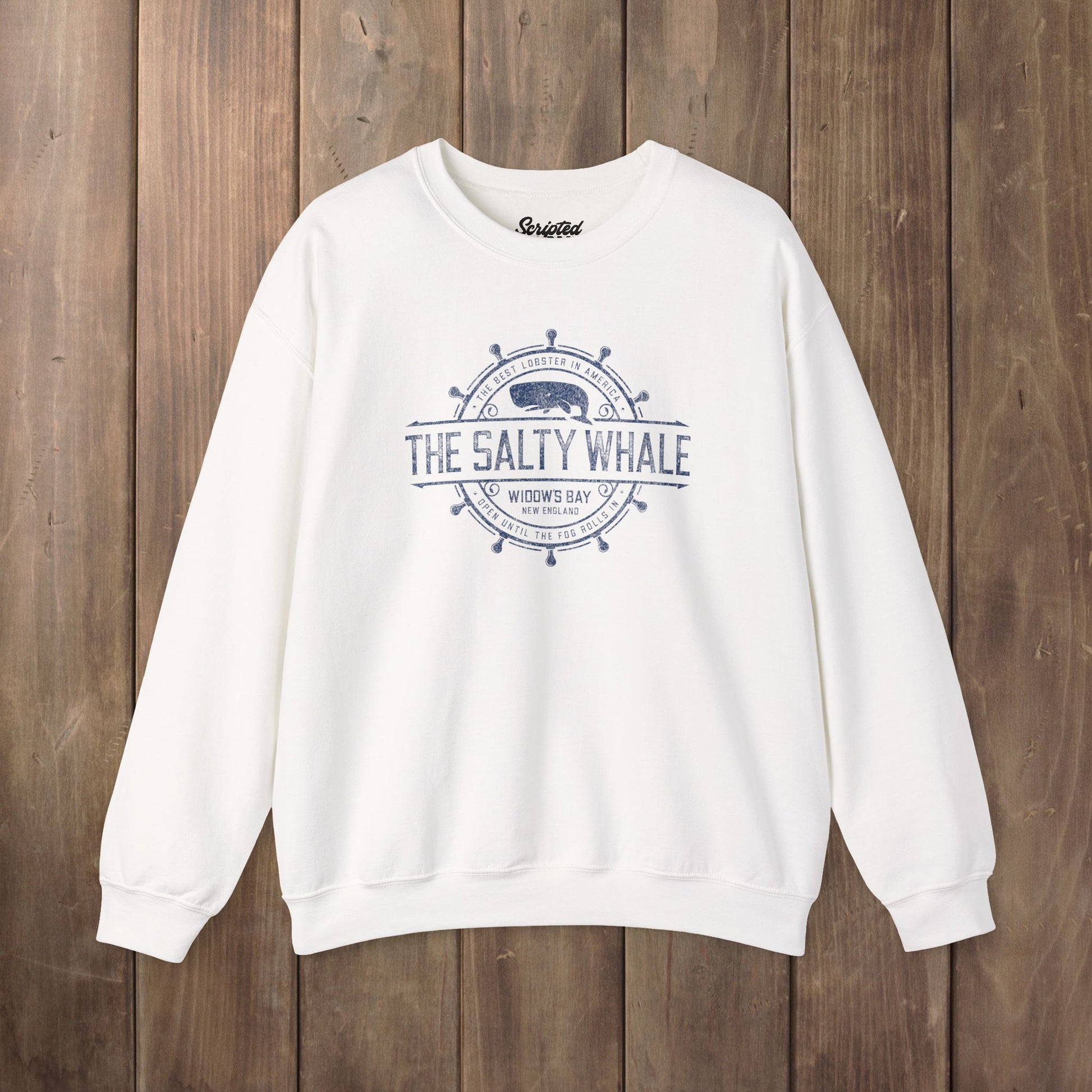 White Gildan crewneck sweatshirt with the distressed Salty Whale maritime crest logo from TV show Widow's Bay