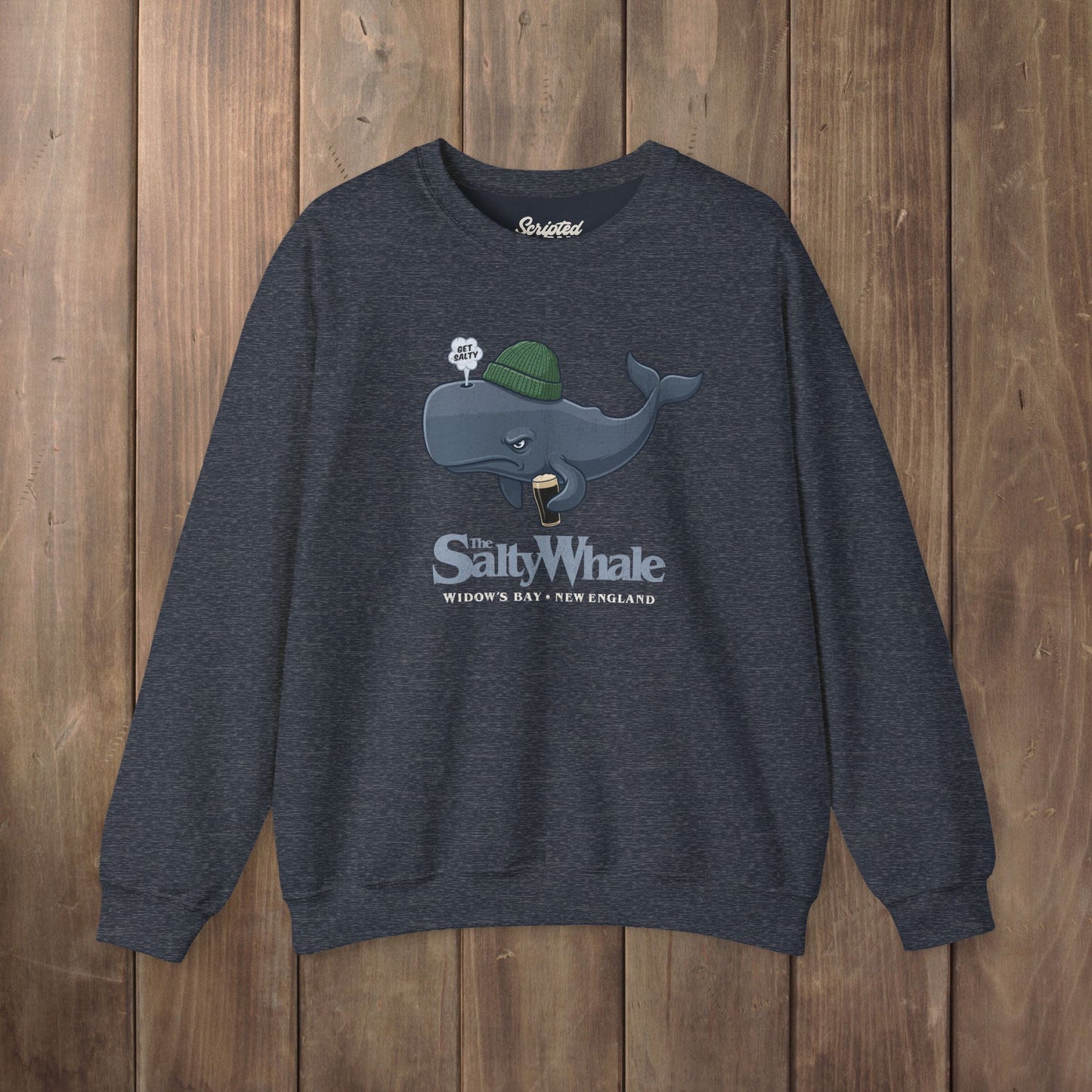 Heather navy blue colored The Salty Whale cartoon mascot crewneck sweatshirt inspired by Widow's Bay Apple TV series, vintage pub fan pullover