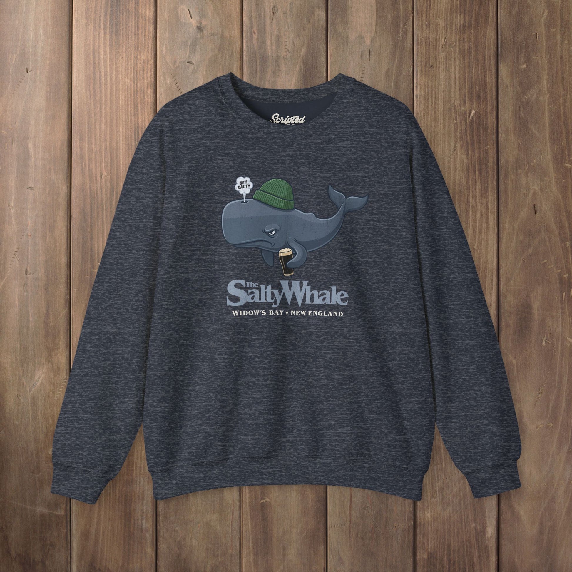 Heather navy blue colored The Salty Whale cartoon mascot crewneck sweatshirt inspired by Widow's Bay Apple TV series, vintage pub fan pullover