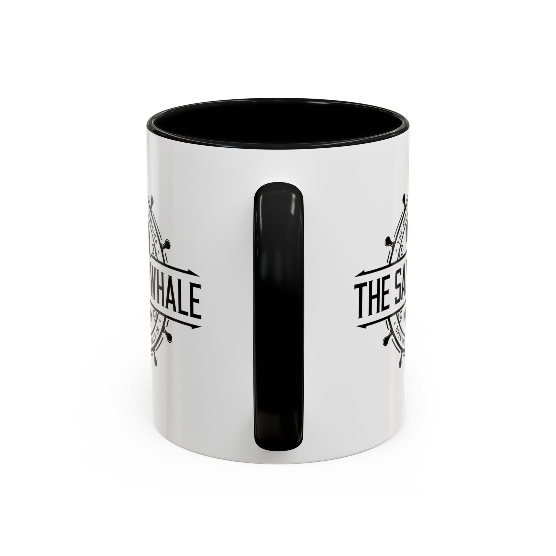 Handle view of White ceramic mug with black handle and the vintage Salty Whale maritime crest logo from Widow's Bay TV show, New England
