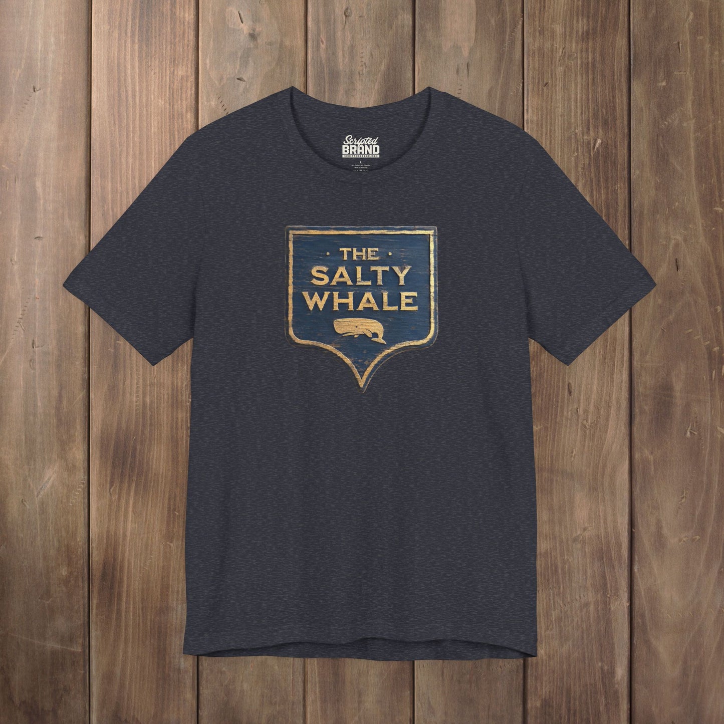 Heather navy blue 'The Salty Whale' weathered carved-wood pub sign t-shirt inspired by Widow's Bay Apple TV series, heather Bella+Canvas tee