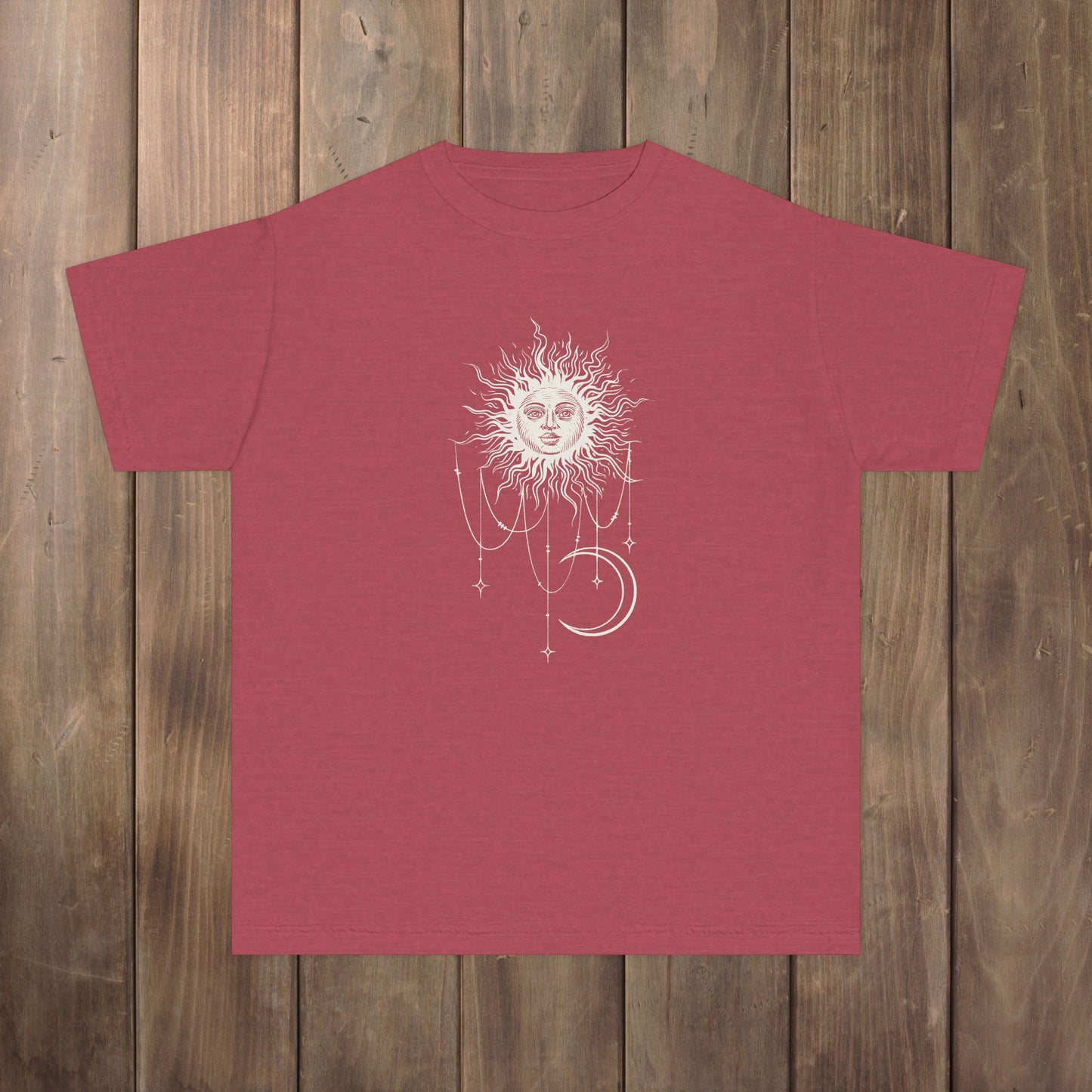 Front of Crimson youth tee with Patricia boho celestial sun, stars, and crescent moon design from Widow's Bay