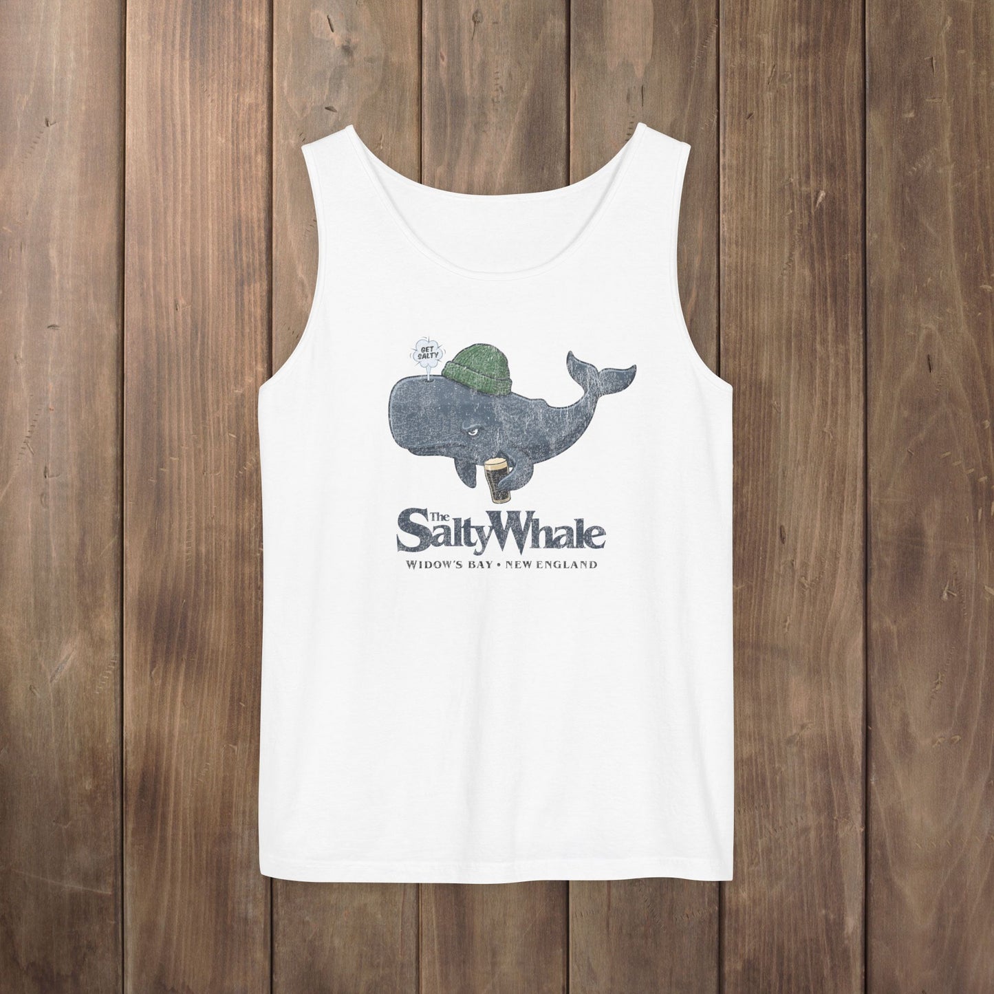 White Comfort Colors tank with the Salty Whale logo from Widow's Bay, a beanie-wearing cartoon whale drinking dark beer