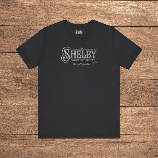 Black Bella+Canvas 3001 t-shirt featuring a vintage Shelby Company Limited logo from Peaky Blinders.