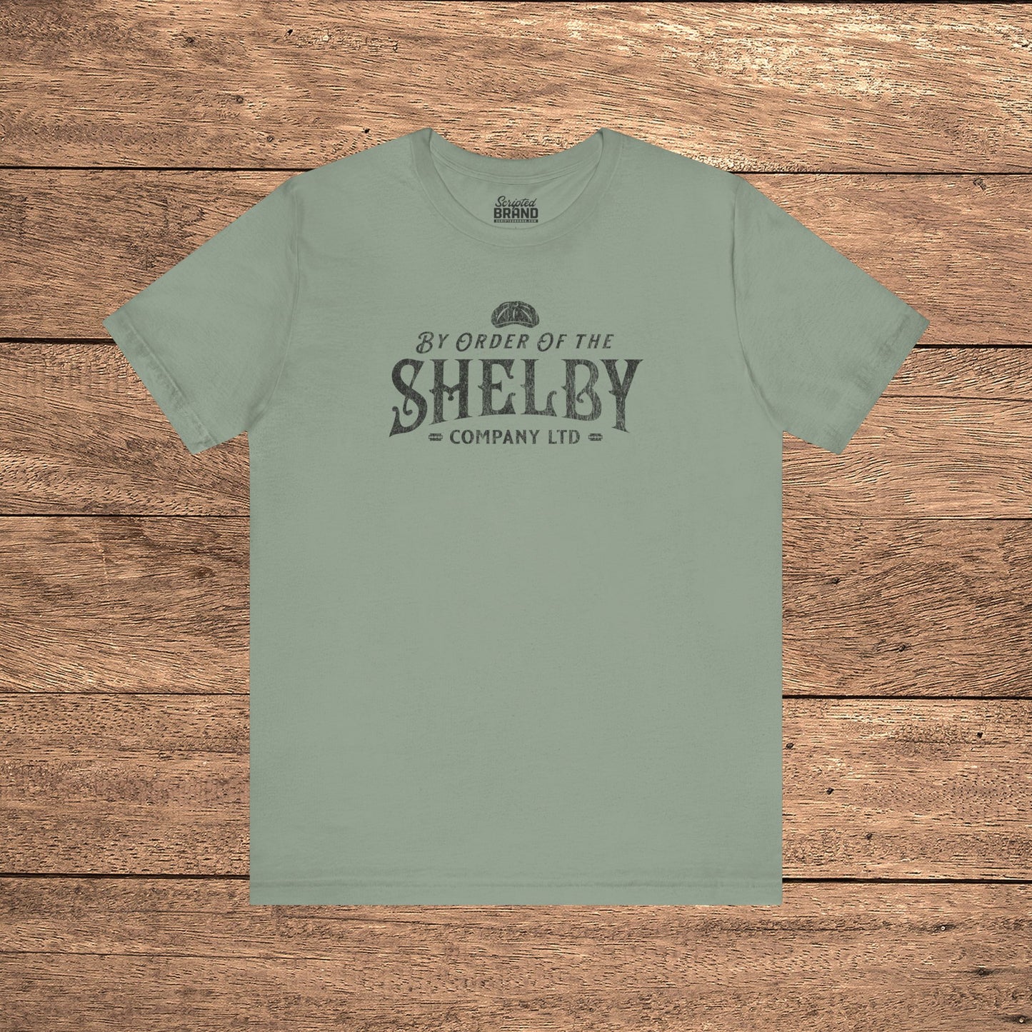 Sage green Bella+Canvas 3001 t-shirt featuring a Shelby Company Limited logo graphic from Peaky Blinders.