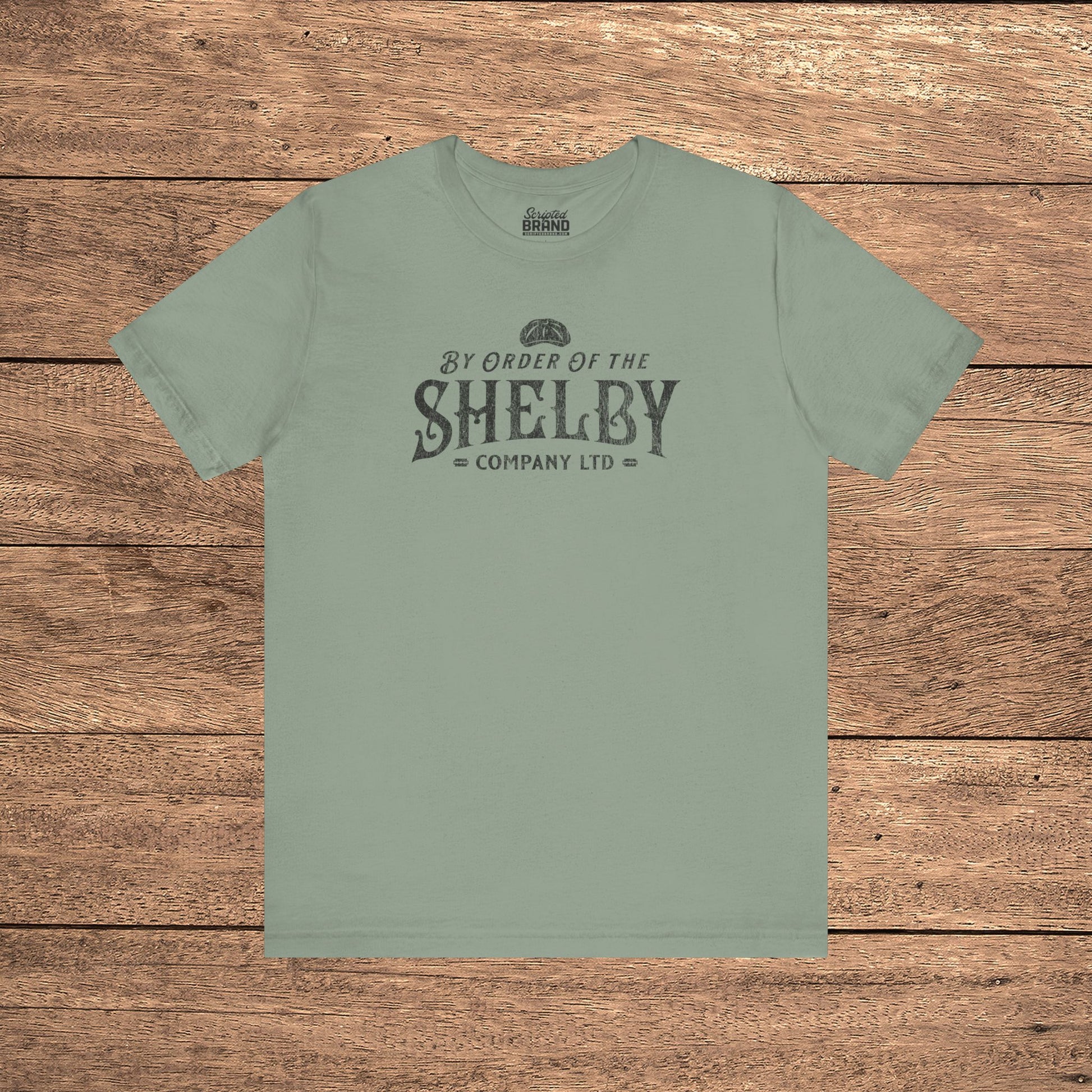 Sage green Bella+Canvas 3001 t-shirt featuring a Shelby Company Limited logo graphic from Peaky Blinders.