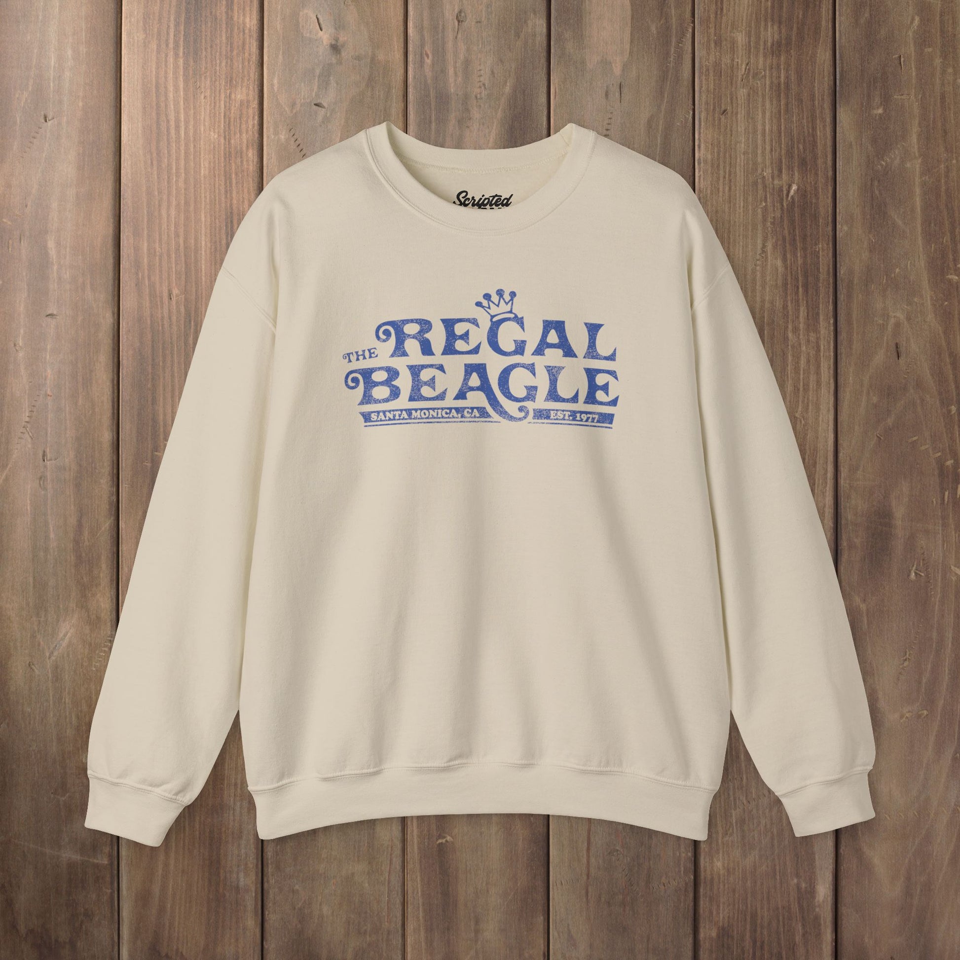 Sand beige crewneck sweatshirt with vintage distressed blue Regal Beagle Three's Company logo