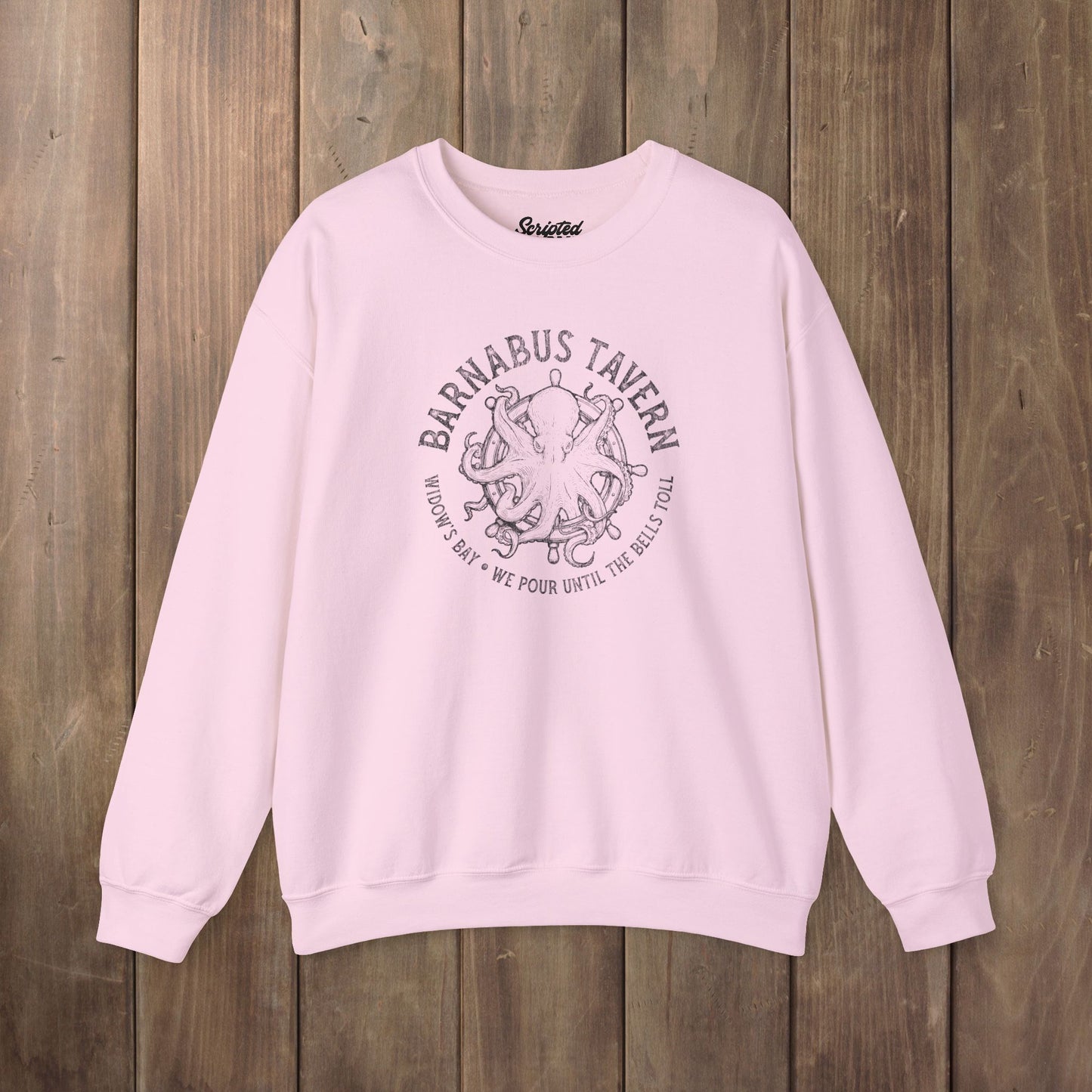 Pink crewneck sweatshirt with vintage Barnabus Tavern graphic from Widow's Bay TV show octopus design