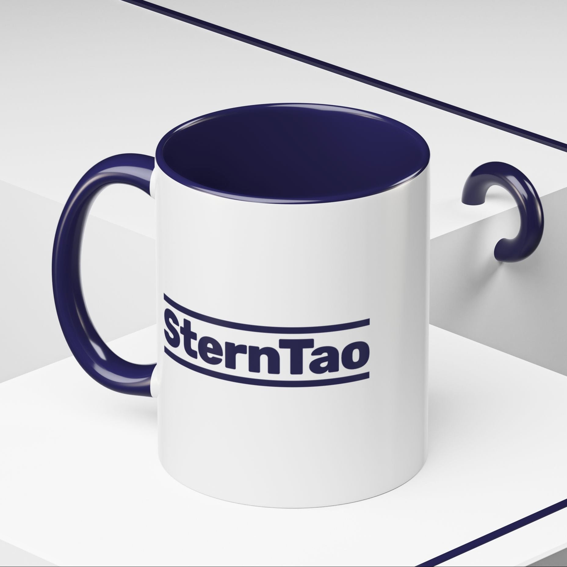 White mug with blue interior and handle, featuring 'SternTao' branding, on a white background.