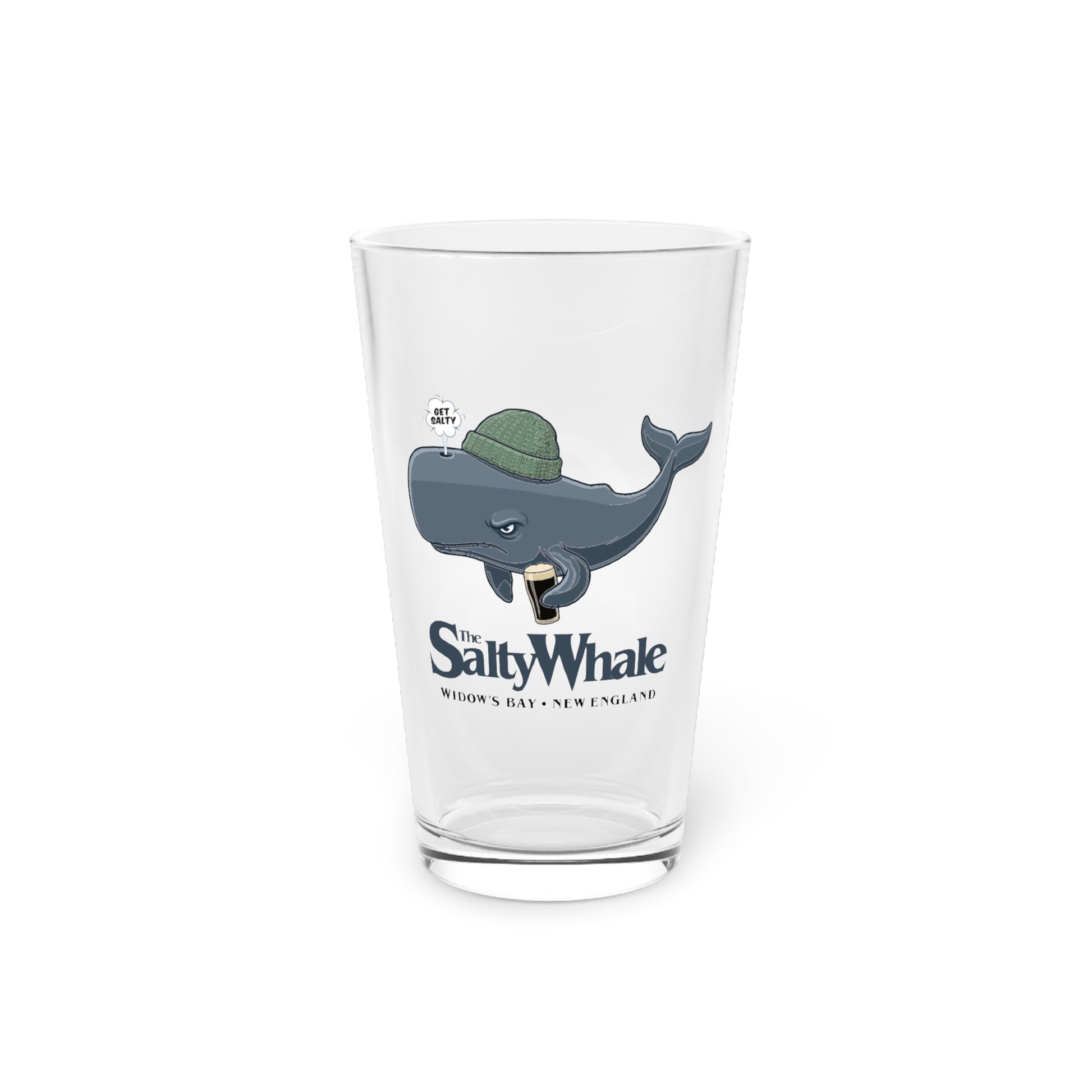 The Salty Whale cartoon mascot pint glass inspired by Widow's Bay Apple TV series, 16oz beer glass with white background