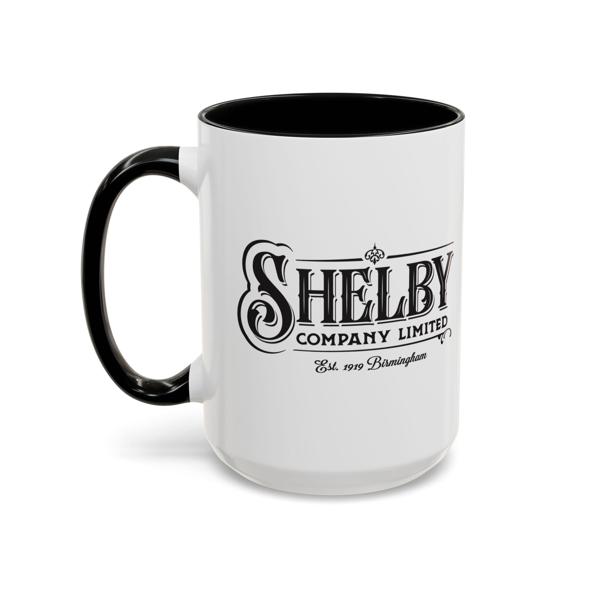 Front view of a 15 oz White Ceramic Mug with black handle/interior featuring the fictional Shelby Company Limited Logo from the TV show Peaky Blinders printed on both sides. Black handle is on the left side. Graphic is designed by ScriptedBrand and includes the text "Est. 1919 Birmingham".