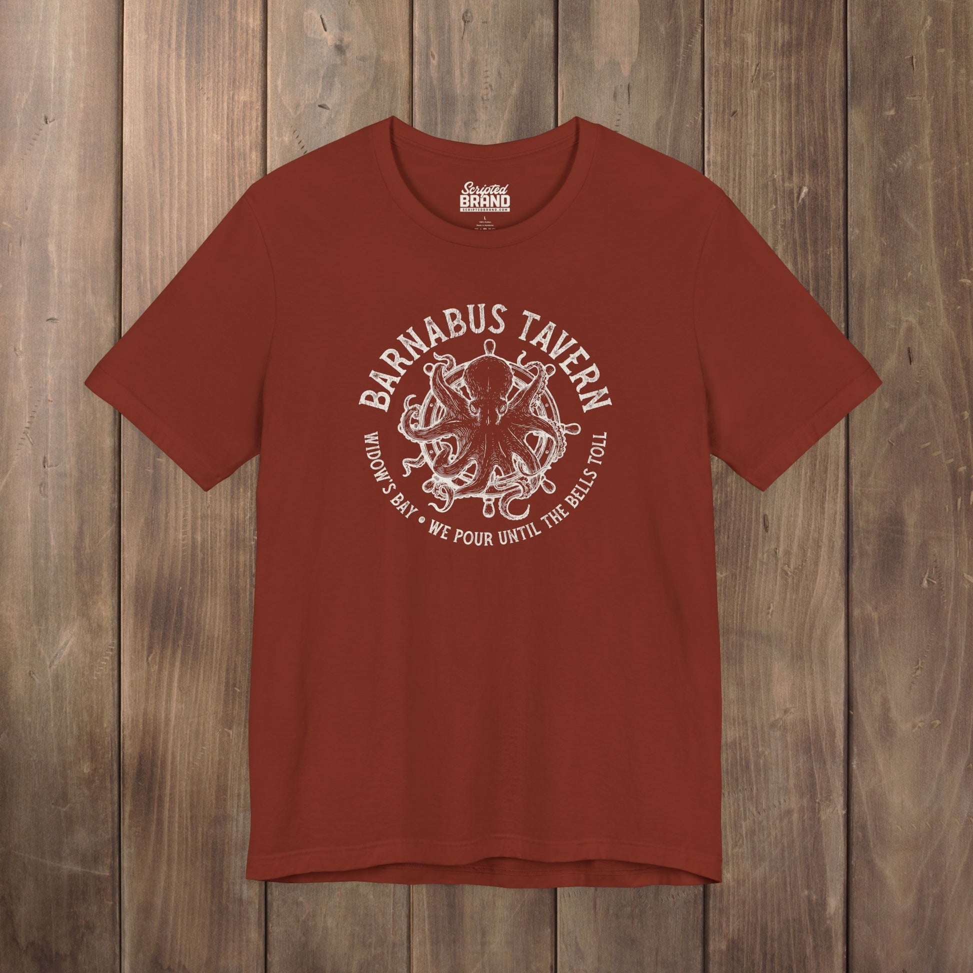 Rust red tee with vintage engraved Barnabus Tavern octopus and ship's wheel Widow's Bay design
