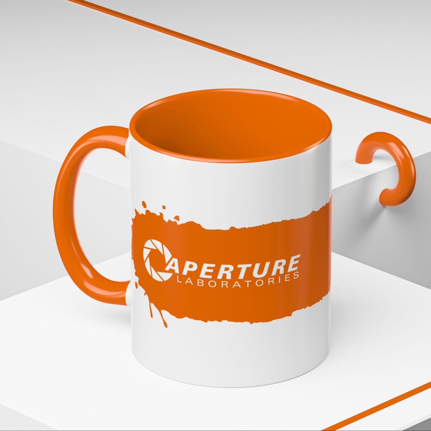 Angled view of 11oz Portal 2 Aperture Laboratories orange Propulsion Gel accent mug with orange handle, glossy ceramic.