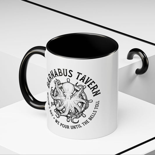 Angled view of 11 oz White accent mug with black handle on left and vintage Barnabus Tavern octopus ship's wheel design inspired by Widow's Bay.