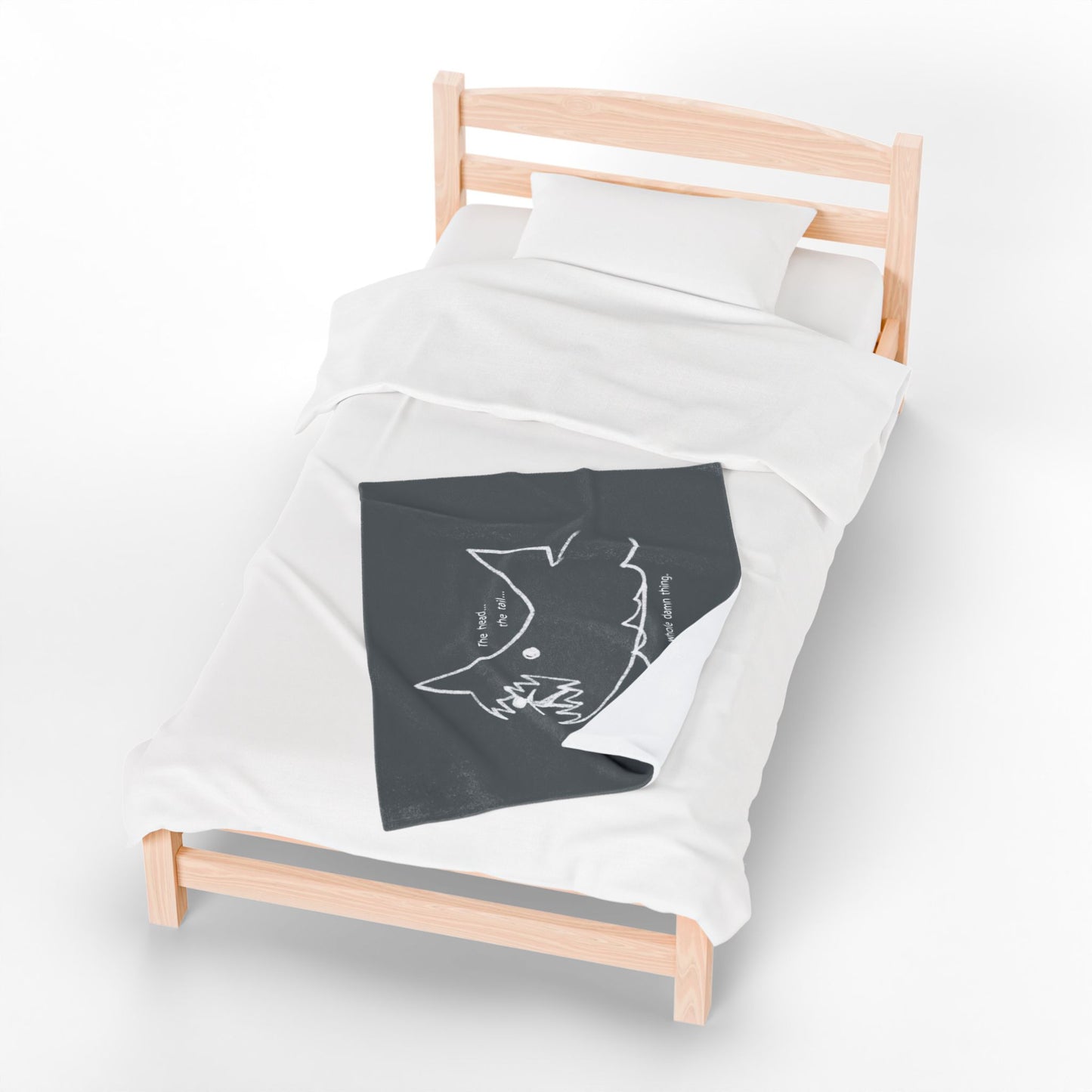 Top down view of 30x40 Velveteen plush blanket with Quint’s chalkboard shark drawing from Jaws, shown draped on a bed.