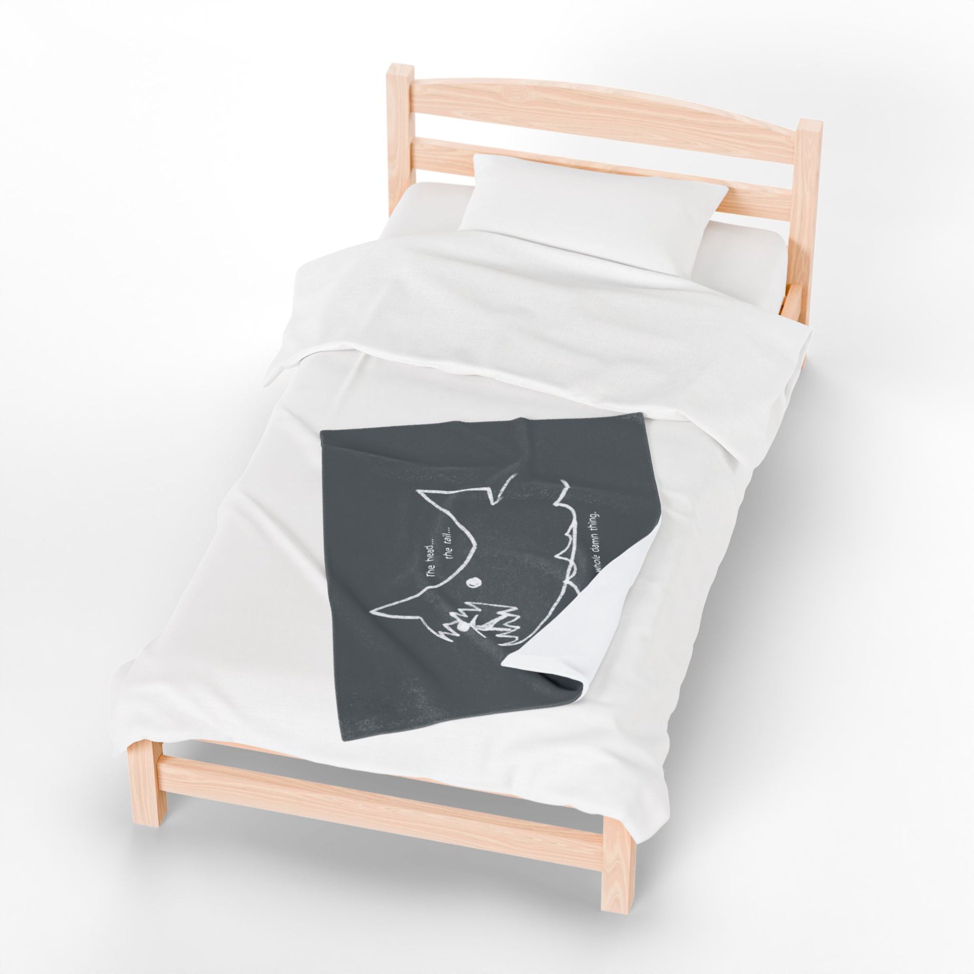 Top down view of 30x40 Velveteen plush blanket with Quint’s chalkboard shark drawing from Jaws, shown draped on a bed.